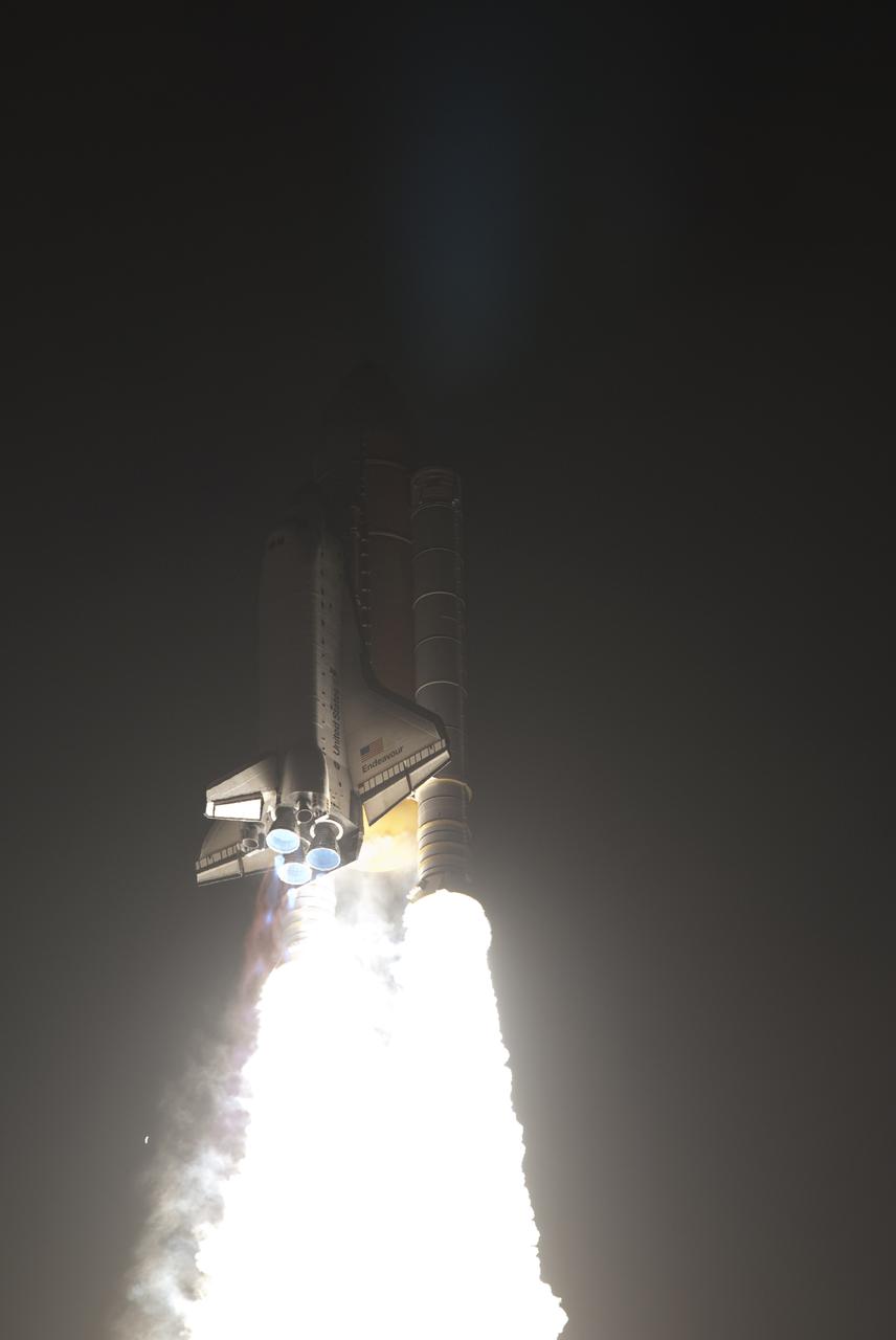 CAPE CANAVERAL, Fla. - In a blinding flash, space shuttle Endeavour races to orbit from Launch Pad 39A at NASA's Kennedy Space Center in Florida. Launch of the STS-130 mission to the International Space Station was at 4:14 a.m. EST. This was the second launch attempt for space shuttle Endeavour's STS-130 crew and the final scheduled space shuttle night launch. The first attempt on Feb. 7 was scrubbed due to unfavorable weather. The primary payload for the STS-130 mission to the International Space Station is the Tranquility node, a pressurized module that will provide additional room for crew members and many of the station's life support and environmental control systems. Attached to one end of Tranquility is a cupola, a unique work area with six windows on its sides and one on top. The cupola resembles a circular bay window and will provide a vastly improved view of the station's exterior. The multi-directional view will allow the crew to monitor spacewalks and docking operations, as well as provide a spectacular view of Earth and other celestial objects. The module was built in Turin, Italy, by Thales Alenia Space for the European Space Agency. For information on the STS-130 mission and crew, visit http:__www.nasa.gov_mission_pages_shuttle_shuttlemissions_sts130_index.html. Photo credit: NASA_ Michael Gayle and Rusty Backer