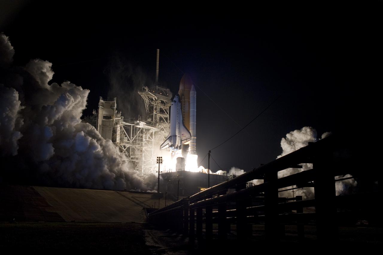 CAPE CANAVERAL, Fla. - An exhaust cloud forms at Launch Pad 39A at NASA's Kennedy Space Center in Florida as space shuttle Endeavour thunders into the night sky.  Launch of the STS-130 mission to the International Space Station was at 4:14 a.m. EST.  This was the second launch attempt for space shuttle Endeavour's STS-130 crew and the final scheduled space shuttle night launch.  The first attempt on Feb. 7 was scrubbed due to unfavorable weather. The primary payload for the STS-130 mission to the International Space Station is the Tranquility node, a pressurized module that will provide additional room for crew members and many of the station's life support and environmental control systems. Attached to one end of Tranquility is a cupola, a unique work area with six windows on its sides and one on top.  The cupola resembles a circular bay window and will provide a vastly improved view of the station's exterior. The multi-directional view will allow the crew to monitor spacewalks and docking operations, as well as provide a spectacular view of Earth and other celestial objects. The module was built in Turin, Italy, by Thales Alenia Space for the European Space Agency.  For information on the STS-130 mission and crew, visit http:__www.nasa.gov_mission_pages_shuttle_shuttlemissions_sts130_index.html.  Photo credit: NASA_Sandra Joseph and Kevin O'Connell