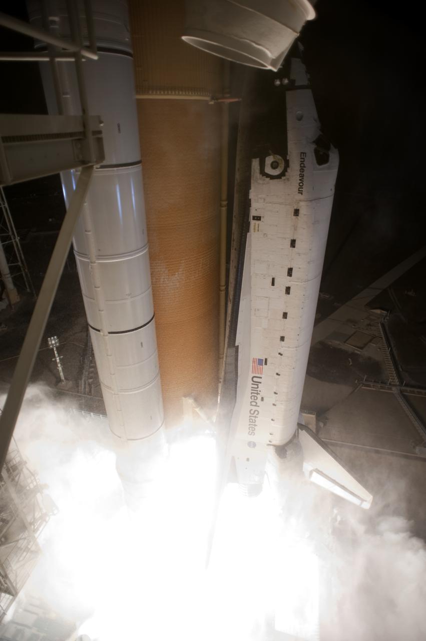 CAPE CANAVERAL, Fla. - In a blinding flash, space shuttle Endeavour begins its climb to orbit from Launch Pad 39A at NASA's Kennedy Space Center in Florida. Launch of the STS-130 mission to the International Space Station was at 4:14 a.m. EST. This was the second launch attempt for space shuttle Endeavour's STS-130 crew and the final scheduled space shuttle night launch. The first attempt on Feb. 7 was scrubbed due to unfavorable weather. The primary payload for the STS-130 mission to the International Space Station is the Tranquility node, a pressurized module that will provide additional room for crew members and many of the station's life support and environmental control systems. Attached to one end of Tranquility is a cupola, a unique work area with six windows on its sides and one on top. The cupola resembles a circular bay window and will provide a vastly improved view of the station's exterior. The multi-directional view will allow the crew to monitor spacewalks and docking operations, as well as provide a spectacular view of Earth and other celestial objects. The module was built in Turin, Italy, by Thales Alenia Space for the European Space Agency. For information on the STS-130 mission and crew, visit http:__www.nasa.gov_mission_pages_shuttle_shuttlemissions_sts130_index.html. Photo credit: Photo credit: NASA_Tony Gray and Tom Farrar Sr.