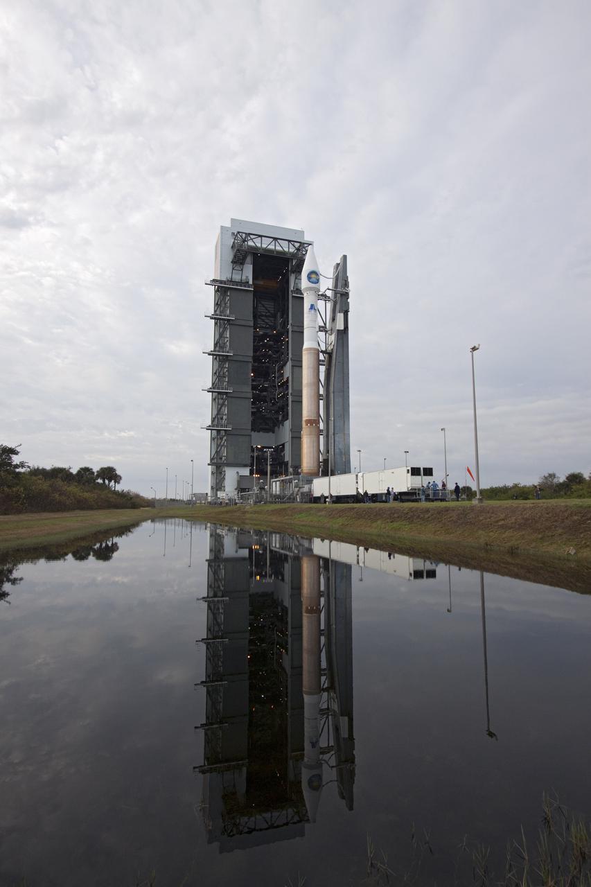 CAPE CANAVERAL, Fla. – The United Launch Alliance Atlas V rocket, with NASA's Solar Dynamics Observatory atop, emerges from the Vertical Integration Facility on its move to Launch Complex 41 on Cape Canaveral Air Force Station.  The observatory, known as SDO, is the first mission in NASA's Living With a Star Program and is designed to study the causes of solar variability and its impacts on Earth. The spacecraft's long-term measurements will give solar scientists in-depth information to help characterize the interior of the Sun, the Sun's magnetic field, the hot plasma of the solar corona, and the density of radiation that creates the ionosphere of the planets. The information will be used to create better forecasts of space weather needed to protect the aircraft, satellites and astronauts living and working in space. Liftoff is set for 10:26 a.m. EST Feb. 10. For information on SDO, visit http:__www.nasa.gov_sdo.  Photo credit: NASA_Jack Pfaller