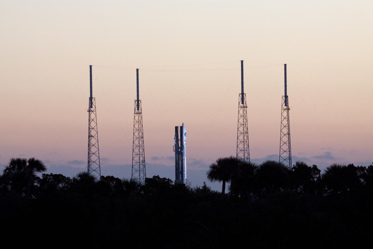 CAPE CANAVERAL, Fla. – As the sun rises over Launch Complex 41 on Cape Canaveral Air Force Station, preparations are under way to launch the United Launch Alliance Atlas V rocket with NASA's Solar Dynamics Observatory aboard.  Liftoff was at 10:23 a.m. EST Feb. 11.   This is the 100th launch of a commercial Atlas_Centaur rocket.  The observatory, known as SDO, is the first mission in NASA's Living With a Star Program and is designed to study the causes of solar variability and its impacts on Earth. The spacecraft's long-term measurements will give solar scientists in-depth information to help characterize the interior of the Sun, the Sun's magnetic field, the hot plasma of the solar corona, and the density of radiation that creates the ionosphere of the planets. The information will be used to create better forecasts of space weather needed to protect the aircraft, satellites and astronauts living and working in space. For information on SDO, visit http:__www.nasa.gov_sdo.  Photo credit: NASA_Jack Pfaller