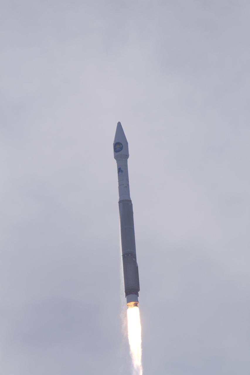 CAPE CANAVERAL, Fla. – A United Launch Alliance Atlas V rocket carrying NASA's Solar Dynamics Observatory heads toward the thin upper-level clouds over Launch Complex 41 on Cape Canaveral Air Force Station on a crisp Florida morning. Liftoff was at 10:23 a.m. EST Feb. 11. This is the 100th launch of a commercial Atlas_Centaur rocket. The observatory, known as SDO, is the first mission in NASA's Living With a Star Program and is designed to study the causes of solar variability and its impacts on Earth. The spacecraft's long-term measurements will give solar scientists in-depth information to help characterize the interior of the Sun, the Sun's magnetic field, the hot plasma of the solar corona, and the density of radiation that creates the ionosphere of the planets. The information will be used to create better forecasts of space weather needed to protect the aircraft, satellites and astronauts living and working in space. For information on SDO, visit http:__www.nasa.gov_sdo. Photo credit: NASA_Kenny Allen and Rusty Backer