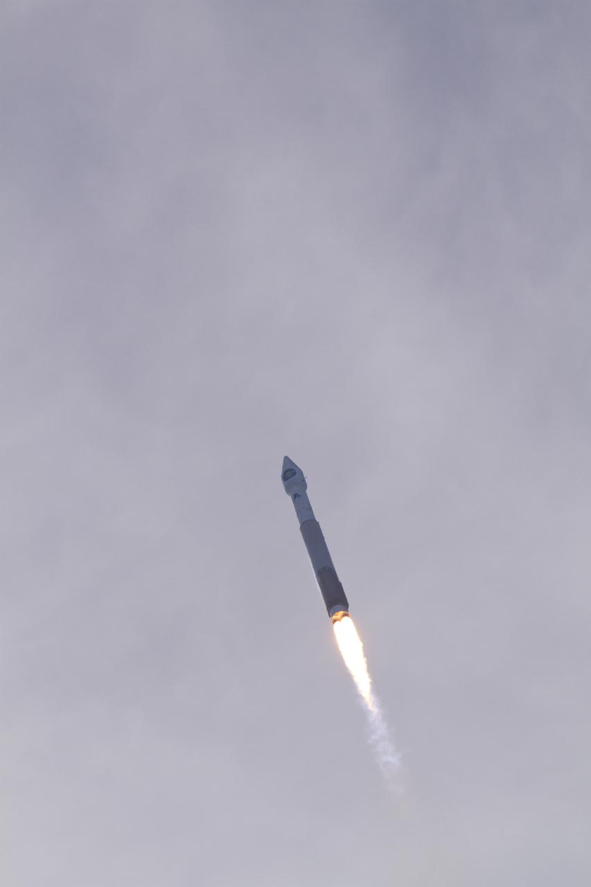 CAPE CANAVERAL, Fla. – A United Launch Alliance Atlas V rocket carrying NASA's Solar Dynamics Observatory heads into the thin upper-level clouds over Launch Complex 41 on Cape Canaveral Air Force Station on a crisp Florida morning. Liftoff was at 10:23 a.m. EST Feb. 11. This is the 100th launch of a commercial Atlas_Centaur rocket. The observatory, known as SDO, is the first mission in NASA's Living With a Star Program and is designed to study the causes of solar variability and its impacts on Earth. The spacecraft's long-term measurements will give solar scientists in-depth information to help characterize the interior of the Sun, the Sun's magnetic field, the hot plasma of the solar corona, and the density of radiation that creates the ionosphere of the planets. The information will be used to create better forecasts of space weather needed to protect the aircraft, satellites and astronauts living and working in space. For information on SDO, visit http:__www.nasa.gov_sdo. Photo credit: NASA_Kenny Allen and Rusty Backer