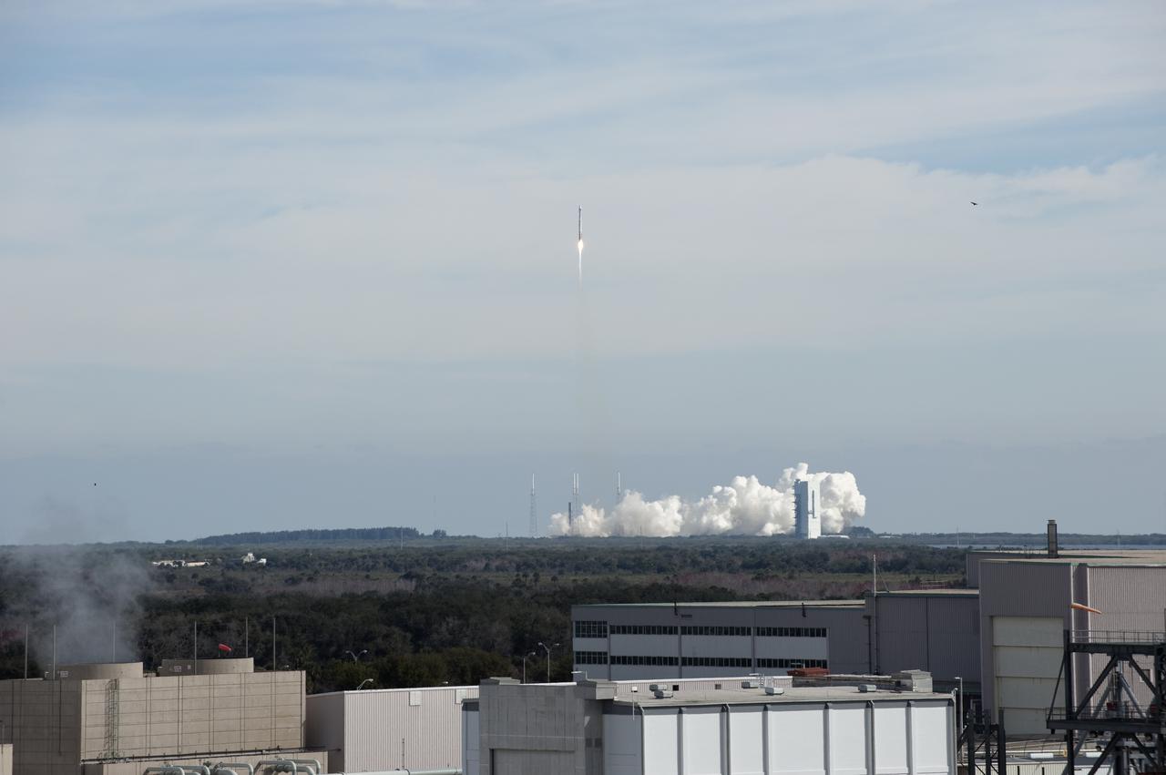 CAPE CANAVERAL, Fla. – Visibility of the launch of the United Launch Alliance Atlas V rocket carrying NASA's Solar Dynamics Observatory is good from a rooftop in the Industrial Area of NASA's Kennedy Space Center. Liftoff from Launch Complex 41 on Cape Canaveral Air Force Station was at 10:23 a.m. EST Feb. 11. This is the 100th launch of a commercial Atlas_Centaur rocket. The observatory, known as SDO, is the first mission in NASA's Living With a Star Program and is designed to study the causes of solar variability and its impacts on Earth. The spacecraft's long-term measurements will give solar scientists in-depth information to help characterize the interior of the Sun, the Sun's magnetic field, the hot plasma of the solar corona, and the density of radiation that creates the ionosphere of the planets. The information will be used to create better forecasts of space weather needed to protect the aircraft, satellites and astronauts living and working in space. For information on SDO, visit http:__www.nasa.gov_sdo. Photo credit: NASA_Tony Gray