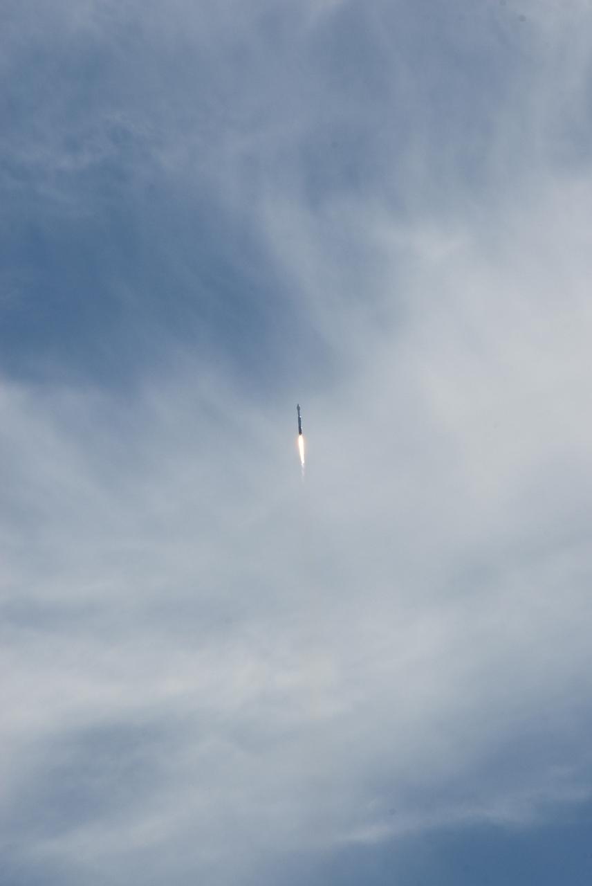 CAPE CANAVERAL, Fla. – Thin upper-level clouds do not obstruct the view of the United Launch Alliance Atlas V rocket carrying NASA's Solar Dynamics Observatory as it travels to orbit.  Liftoff from Launch Complex 41 on Cape Canaveral Air Force Station was at 10:23 a.m. EST Feb. 11. This is the 100th launch of a commercial Atlas_Centaur rocket.  The observatory, known as SDO, is the first mission in NASA's Living With a Star Program and is designed to study the causes of solar variability and its impacts on Earth. The spacecraft's long-term measurements will give solar scientists in-depth information to help characterize the interior of the Sun, the Sun's magnetic field, the hot plasma of the solar corona, and the density of radiation that creates the ionosphere of the planets. The information will be used to create better forecasts of space weather needed to protect the aircraft, satellites and astronauts living and working in space. For information on SDO, visit http:__www.nasa.gov_sdo.  Photo credit: NASA_Kim Shiflett