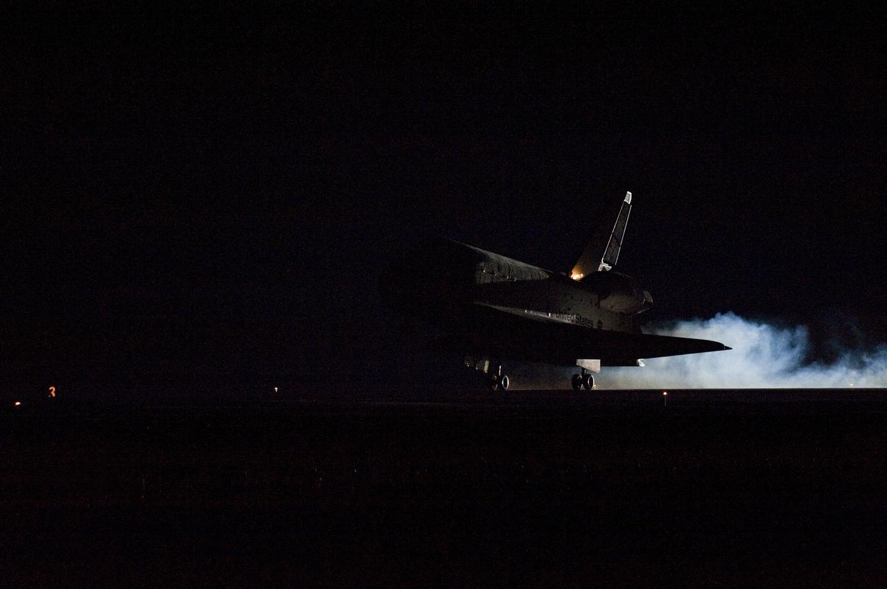 CAPE CANAVERAL, Fla. - Touchdown is apparent by the streams of smoke trailing space shuttle Endeavour as its main landing gear tires contact Runway 15 at the Shuttle Landing Facility at NASA's Kennedy Space Center in Florida. After 14 days in space, Endeavour's 5.7-million-mile STS-130 mission is completed on orbit 217. Main gear touchdown was at 10:20:31 p.m. EST followed by nose gear touchdown at 10:20:39 p.m. and wheels stop at 10:22:10 p.m. It was the 23rd night landing in shuttle history and the 17th at Kennedy. Aboard are Commander George Zamka; Pilot Terry Virts; and Mission Specialists Robert Behnken, Nicholas Patrick, Kathryn Hire and Stephen Robinson. During Endeavour's STS-130 mission, astronauts installed the Tranquility node, a module that provides additional room for crew members and many of the station's life support and environmental control systems. Attached to Tranquility is a cupola with seven windows that provide a panoramic view of Earth, celestial objects and visiting spacecraft. The module was built in Turin, Italy, by Thales Alenia Space for the European Space Agency. The orbiting laboratory is approximately 90 percent complete now in terms of mass. STS-130 was the 24th flight for Endeavour, the 32nd shuttle mission devoted to ISS assembly and maintenance, and the 130th shuttle mission to date. For information on the STS-130 mission and crew, visit http:__www.nasa.gov_mission_pages_shuttle_shuttlemissions_sts130_index.html. Photo credit: NASA_ Tom Farrar Jr.