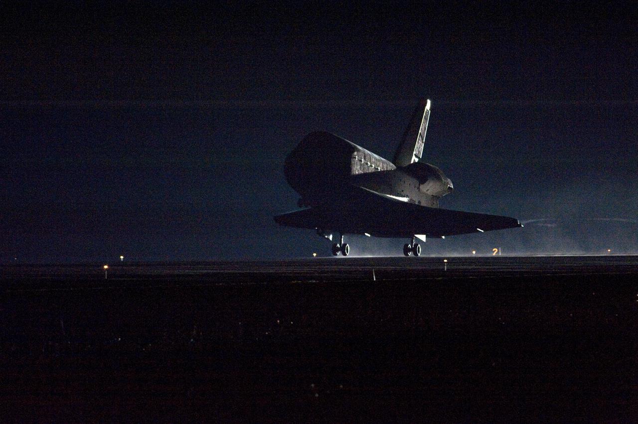 CAPE CANAVERAL, Fla. - Space shuttle Endeavour touches down on Runway 15 at the Shuttle Landing Facility at NASA's Kennedy Space Center in Florida after 14 days in space, completing the 5.7-million-mile STS-130 mission to the International Space Station on orbit 217.  Main gear touchdown was at 10:20:31 p.m. EST followed by nose gear touchdown at 10:20:39 p.m. and wheels stop at 10:22:10 p.m.  It was the 23rd night landing in shuttle history and the 17th at Kennedy.  Aboard are Commander George Zamka; Pilot Terry Virts; and Mission Specialists Robert Behnken, Nicholas Patrick, Kathryn Hire and Stephen Robinson.  During Endeavour's STS-130 mission, astronauts installed the Tranquility node, a module that provides additional room for crew members and many of the station's life support and environmental control systems. Attached to Tranquility is a cupola with seven windows that provide a panoramic view of Earth, celestial objects and visiting spacecraft. The module was built in Turin, Italy, by Thales Alenia Space for the European Space Agency.  The orbiting laboratory is approximately 90 percent complete now in terms of mass.  STS-130 was the 24th flight for Endeavour, the 32nd shuttle mission devoted to ISS assembly and maintenance, and the 130th shuttle mission to date.  For information on the STS-130 mission and crew, visit http:__www.nasa.gov_mission_pages_shuttle_shuttlemissions_sts130_index.html.  Photo credit: NASA_Tom Joseph