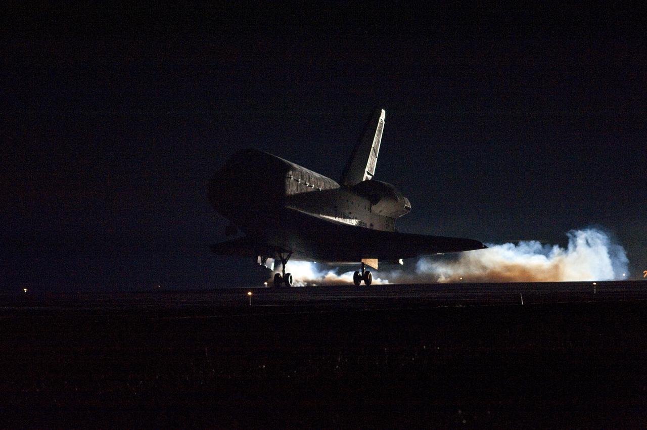 CAPE CANAVERAL, Fla. - Touchdown is evidenced by the streams of smoke trailing space shuttle Endeavour as its main landing gear tires contact Runway 15 at the Shuttle Landing Facility at NASA's Kennedy Space Center in Florida. After 14 days in space, Endeavour's 5.7-million-mile STS-130 mission is completed on orbit 217.  Main gear touchdown was at 10:20:31 p.m. EST followed by nose gear touchdown at 10:20:39 p.m. and wheels stop at 10:22:10 p.m.  It was the 23rd night landing in shuttle history and the 17th at Kennedy.  Aboard are Commander George Zamka; Pilot Terry Virts; and Mission Specialists Robert Behnken, Nicholas Patrick, Kathryn Hire and Stephen Robinson.  During Endeavour's STS-130 mission, astronauts installed the Tranquility node, a module that provides additional room for crew members and many of the station's life support and environmental control systems. Attached to Tranquility is a cupola with seven windows that provide a panoramic view of Earth, celestial objects and visiting spacecraft. The module was built in Turin, Italy, by Thales Alenia Space for the European Space Agency.  The orbiting laboratory is approximately 90 percent complete now in terms of mass.  STS-130 was the 24th flight for Endeavour, the 32nd shuttle mission devoted to ISS assembly and maintenance, and the 130th shuttle mission to date.  For information on the STS-130 mission and crew, visit http:__www.nasa.gov_mission_pages_shuttle_shuttlemissions_sts130_index.html.  Photo credit: NASA_Tom Joseph