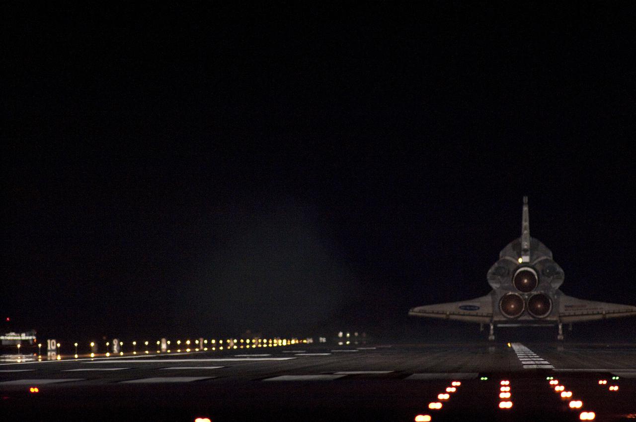 CAPE CANAVERAL, Fla. - STS-130 Commander George Zamka sets space shuttle Endeavour down in the middle of Runway 15 at the Shuttle Landing Facility at NASA's Kennedy Space Center in Florida.  After 14 days in space, Endeavour's 5.7-million-mile STS-130 mission is completed on orbit 217.  Main gear touchdown was at 10:20:31 p.m. EST followed by nose gear touchdown at 10:20:39 p.m. and wheels stop at 10:22:10 p.m.  It was the 23rd night landing in shuttle history and the 17th at Kennedy.  Aboard are Commander George Zamka; Pilot Terry Virts; and Mission Specialists Robert Behnken, Nicholas Patrick, Kathryn Hire and Stephen Robinson.  During Endeavour's STS-130 mission, astronauts installed the Tranquility node, a module that provides additional room for crew members and many of the station's life support and environmental control systems. Attached to Tranquility is a cupola with seven windows that provide a panoramic view of Earth, celestial objects and visiting spacecraft. The module was built in Turin, Italy, by Thales Alenia Space for the European Space Agency.  The orbiting laboratory is approximately 90 percent complete now in terms of mass.  STS-130 was the 24th flight for Endeavour, the 32nd shuttle mission devoted to ISS assembly and maintenance, and the 130th shuttle mission to date.  For information on the STS-130 mission and crew, visit http:__www.nasa.gov_mission_pages_shuttle_shuttlemissions_sts130.  Photo credit: NASA_Sandra Joseph and Kevin O'Connell