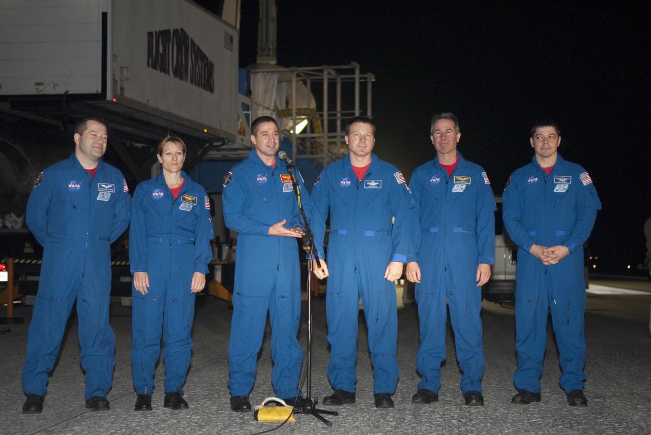 CAPE CANAVERAL, Fla. - 'We're back as we came.  It's dark outside,' quips STS-130 Commander George Zamka following space shuttle Endeavour's successful landing on Runway 15 at the Shuttle Landing Facility at NASA's Kennedy Space Center in Florida. From left are Mission Specialists Nicholas Patrick and Kathryn Hire, Zamka, Pilot Terry Virts, and Mission Specialists Stephen Robinson and Robert Behnken.  After 14 days in space, Endeavour's 5.7-million-mile STS-130 mission was completed on orbit 217.  Main gear touchdown was at 10:20:31 p.m. EST followed by nose gear touchdown at 10:20:39 p.m. and wheels stop at 10:22:10 p.m.  It was the 23rd night landing in shuttle history and the 17th at Kennedy.  During Endeavour's STS-130 mission, astronauts installed the Tranquility node, a module that provides additional room for crew members and many of the station's life support and environmental control systems. Attached to Tranquility is a cupola with seven windows that provide a panoramic view of Earth, celestial objects and visiting spacecraft. The module was built in Turin, Italy, by Thales Alenia Space for the European Space Agency.  The orbiting laboratory is approximately 90 percent complete now in terms of mass.  STS-130 was the 24th flight for Endeavour, the 32nd shuttle mission devoted to ISS assembly and maintenance, and the 130th shuttle mission to date.  For information on the STS-130 mission and crew, visit http:__www.nasa.gov_mission_pages_shuttle_shuttlemissions_sts130_index.html.  Photo credit: NASA_Kim Shiflett