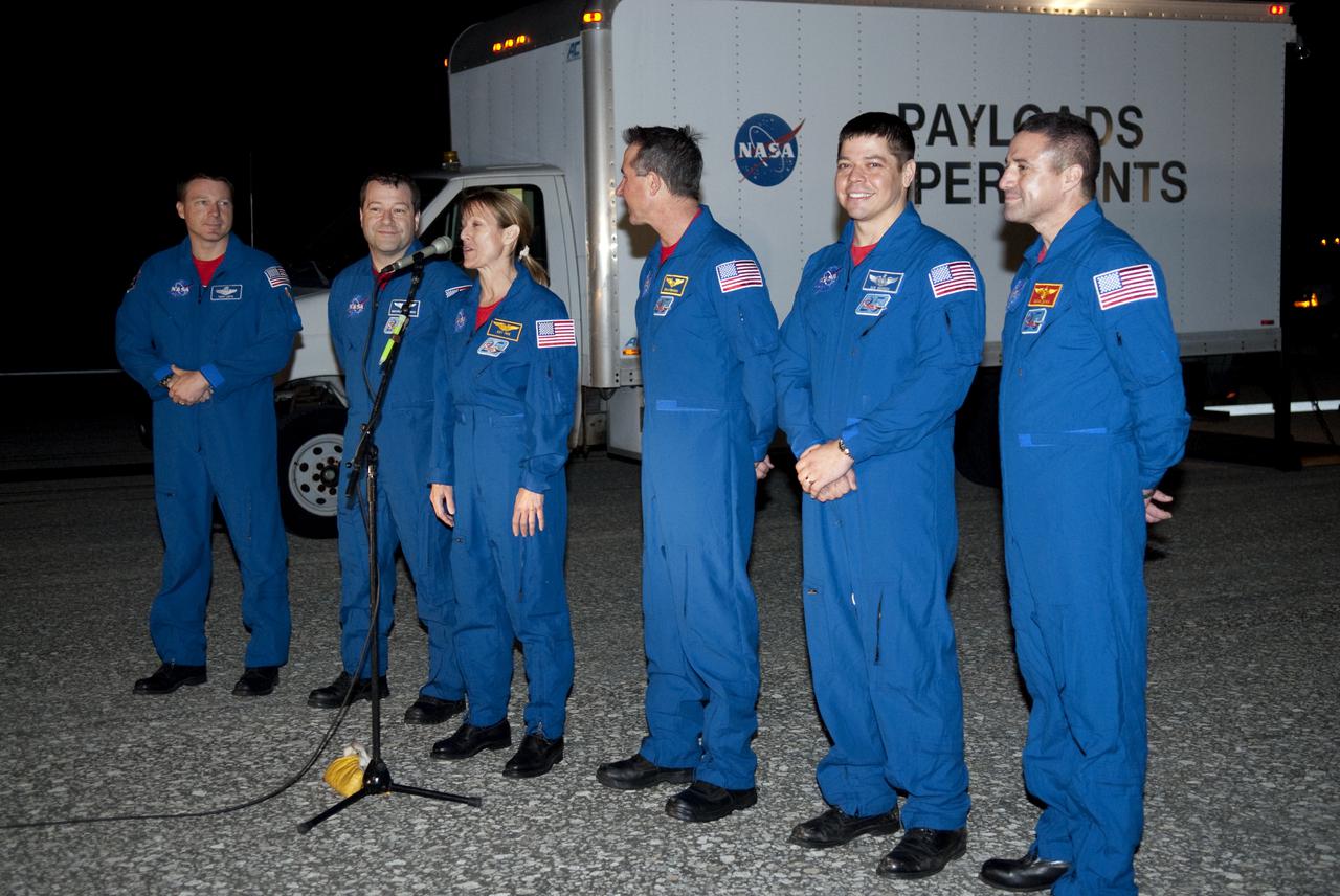 CAPE CANAVERAL, Fla. - 'It’s great to be back at KSC,' remarks STS-130 Mission Specialist Kathryn Hire following space shuttle Endeavour's successful landing on Runway 15 at the Shuttle Landing Facility at NASA's Kennedy Space Center in Florida. From left are Pilot Terry Virts, Mission Specialists Nicholas Patrick, Hire, Mission Specialists Stephen Robinson and Robert Behnken, and Commander George Zamka.  After 14 days in space, Endeavour's 5.7-million-mile STS-130 mission was completed on orbit 217.   Main gear touchdown was at 10:20:31 p.m. EST followed by nose gear touchdown at 10:20:39 p.m. and wheels stop at 10:22:10 p.m.  It was the 23rd night landing in shuttle history and the 17th at Kennedy.  During Endeavour's STS-130 mission, astronauts installed the Tranquility node, a module that provides additional room for crew members and many of the station's life support and environmental control systems. Attached to Tranquility is a cupola with seven windows that provide a panoramic view of Earth, celestial objects and visiting spacecraft. The module was built in Turin, Italy, by Thales Alenia Space for the European Space Agency.  The orbiting laboratory is approximately 90 percent complete now in terms of mass.  STS-130 was the 24th flight for Endeavour, the 32nd shuttle mission devoted to ISS assembly and maintenance, and the 130th shuttle mission to date.  For information on the STS-130 mission and crew, visit http:__www.nasa.gov_mission_pages_shuttle_shuttlemissions_sts130_index.html.  Photo credit: NASA_Kim Shiflett