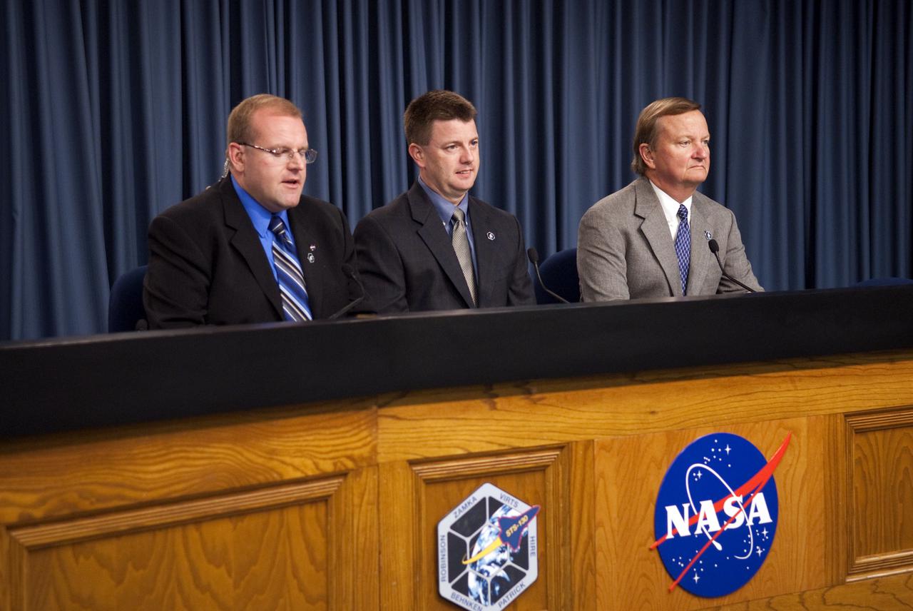 CAPE CANAVERAL, Fla. - In the Press Site auditorium at NASA's Kennedy Space Center in Florida, NASA managers participate in a news conference following the successful landing of space shuttle Endeavour.  From left are Allard Beutel, moderator for NASA public affairs; Mike Moses, space shuttle launch integration manager; and Mike Leinbach, shuttle launch director.  Endeavour touched down on Runway 15 at Kennedy's Shuttle Landing Facility at 10:20 p.m. EST Feb. 21, completing the 5.7-million-mile STS-130 mission on orbit 217.  It was the 23rd night landing in shuttle history and the 17th at Kennedy.  During Endeavour's STS-130 mission, astronauts installed the Tranquility node, a module that provides additional room for crew members and many of the station's life support and environmental control systems. Attached to Tranquility is a cupola with seven windows that provide a panoramic view of Earth, celestial objects and visiting spacecraft. The module was built in Turin, Italy, by Thales Alenia Space for the European Space Agency.  The orbiting laboratory is approximately 90 percent complete now in terms of mass.  STS-130 was the 24th flight for Endeavour, the 32nd shuttle mission devoted to ISS assembly and maintenance, and the 130th shuttle mission to date.  For information on the STS-130 mission and crew, visit http:__www.nasa.gov_mission_pages_shuttle_shuttlemissions_sts130_index.html.  Photo credit: NASA_Kim Shiflett