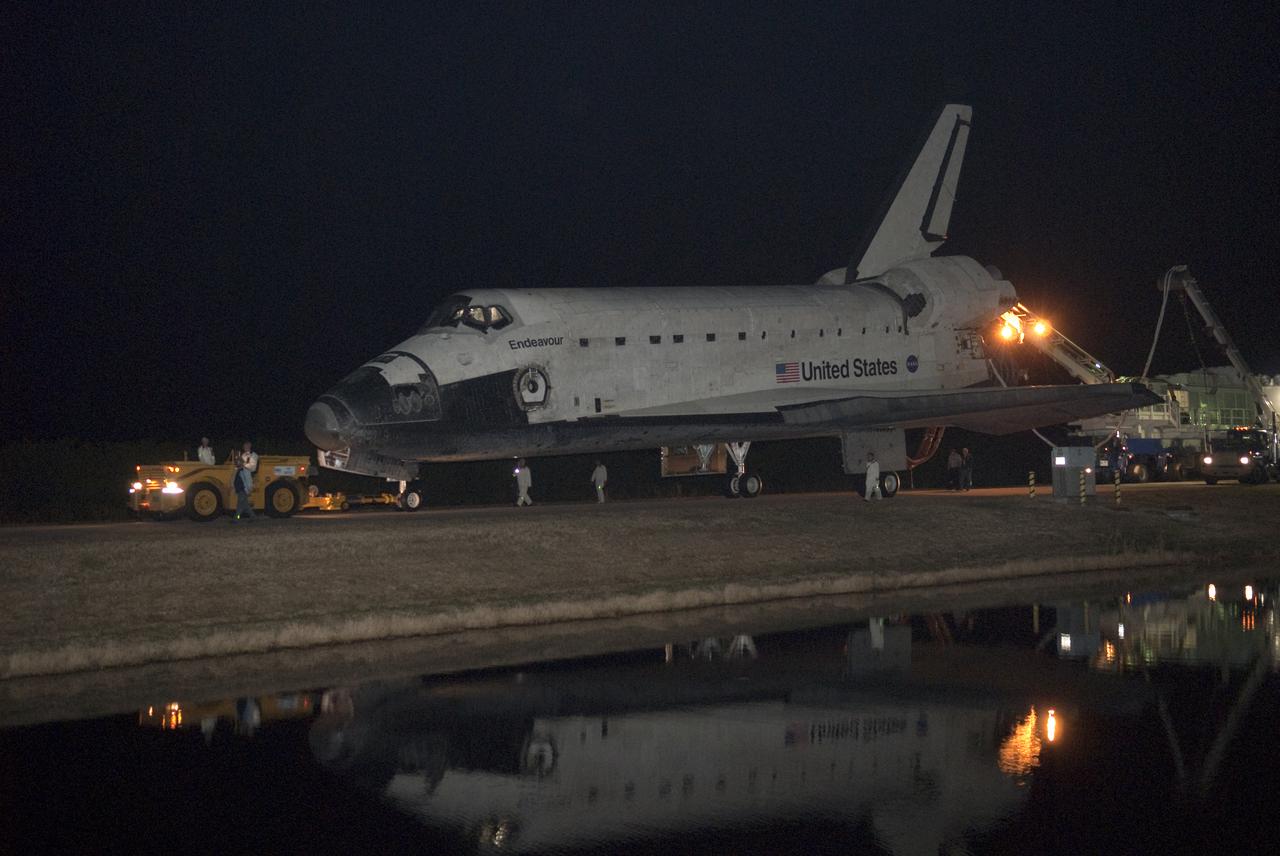 CAPE CANAVERAL, Fla. - At NASA's Kennedy Space Center in Florida, space shuttle Endeavour makes its slow trek from the Shuttle Landing Facility to Orbiter Processing Facility-2 following its successful landing on Runway 15. After 14 days in space, Endeavour's 5.7-million-mile STS-130 mission was completed on orbit 217. Main gear touchdown was at 10:20:31 p.m. EST followed by nose gear touchdown at 10:20:39 p.m. and wheels stop at 10:22:10 p.m. It was the 23rd night landing in shuttle history and the 17th at Kennedy. Aboard were Commander George Zamka; Pilot Terry Virts; and Mission Specialists Robert Behnken, Nicholas Patrick, Kathryn Hire and Stephen Robinson. During Endeavour's STS-130 mission, astronauts installed the Tranquility node, a module that provides additional room for crew members and many of the station's life support and environmental control systems. Attached to Tranquility is a cupola with seven windows that provide a panoramic view of Earth, celestial objects and visiting spacecraft. The module was built in Turin, Italy, by Thales Alenia Space for the European Space Agency. The orbiting laboratory is approximately 90 percent complete now in terms of mass. STS-130 was the 24th flight for Endeavour, the 32nd shuttle mission devoted to ISS assembly and maintenance, and the 130th shuttle mission to date. For information on the STS-130 mission and crew, visit http:__www.nasa.gov_mission_pages_shuttle_shuttlemissions_sts130_index.html. Photo credit: NASA_Kim Shiflett