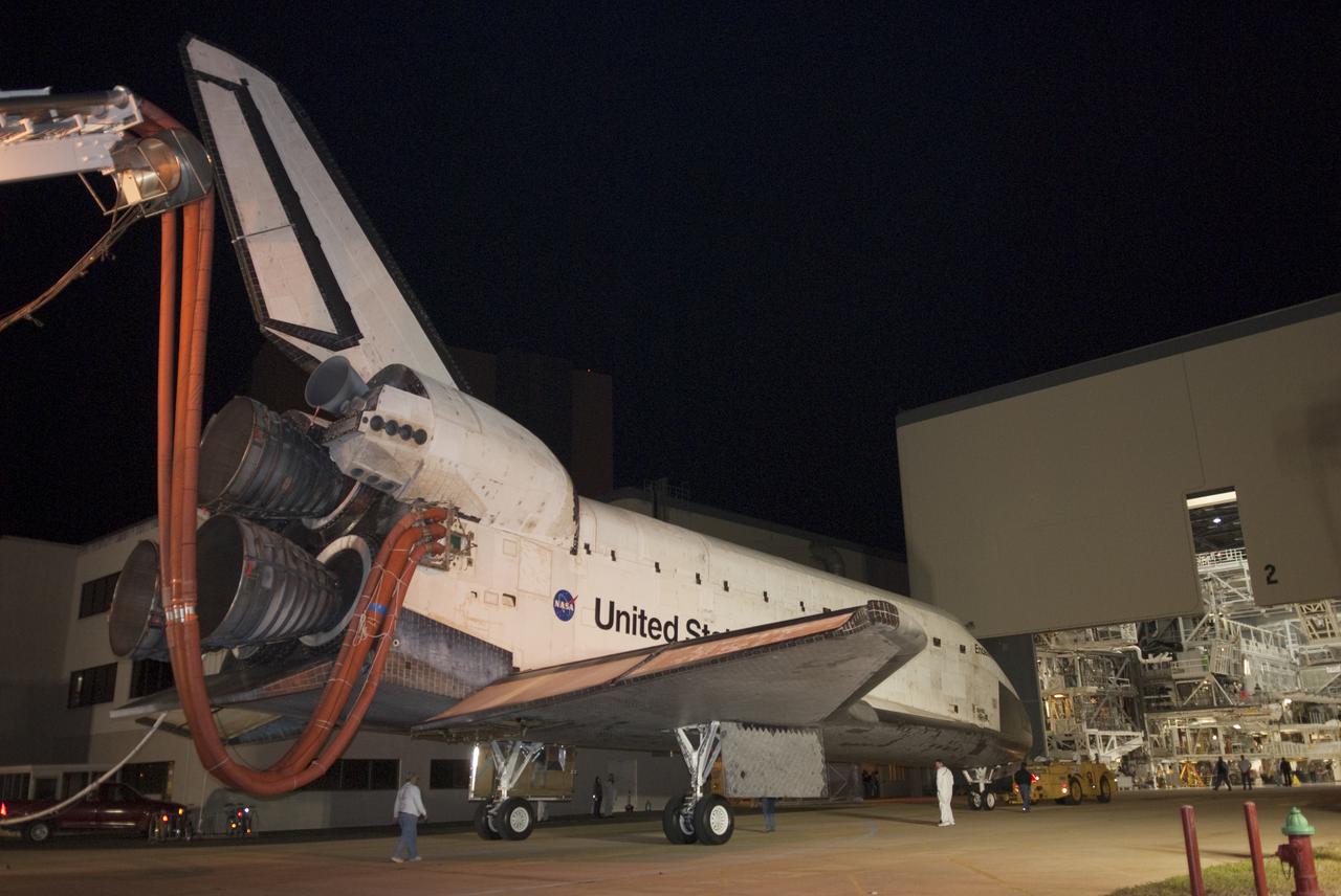CAPE CANAVERAL, Fla. - At NASA's Kennedy Space Center in Florida, space shuttle Endeavour arrives outside Orbiter Processing Facility-2. Endeavour's touchdown at Kennedy's Shuttle Landing Facility following the STS-130 mission to the International Space Station was at 10:20 p.m. EST Feb. 21. Processing now will begin for Endeavour's next flight, STS-134. The six-member STS-134 crew will deliver Express Logistics Carrier 3 and the Alpha Magnetic Spectrometer to the International Space Station, as well as a variety of spare parts including two S-band communications antennas, a high-pressure gas tank, additional spare parts for Dextre and micrometeoroid debris shields. STS-134 will be the 35th shuttle mission to the station and the 133rd flight in the shuttle program. Launch is targeted for July 29. For information on the STS-134 mission and crew, visit http:__www.nasa.gov_mission_pages_shuttle_shuttlemissions_sts134_index.html. Photo credit: NASA_Kim Shiflett