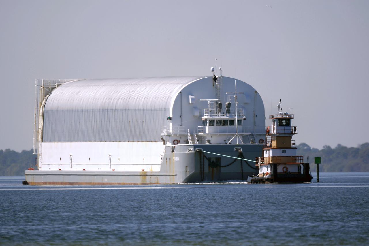 CAPE CANAVERAL, Fla. – The Pegasus barge carrying External Tank-136 arrives near the turn basin at Kennedy Space Center in Florida, from NASA’s Michoud Assembly Facility near New Orleans. ET-136 will be used to launch space shuttle Atlantis on the STS-132 mission to the International Space Station. Launch is targeted for May 14. For more information on the components of the space shuttle and the STS-132 mission, visit http:__www.nasa.gov_mission_pages_shuttle_shuttlemissions_sts132_index.html. Photo credit: NASA_Rusty Backer.