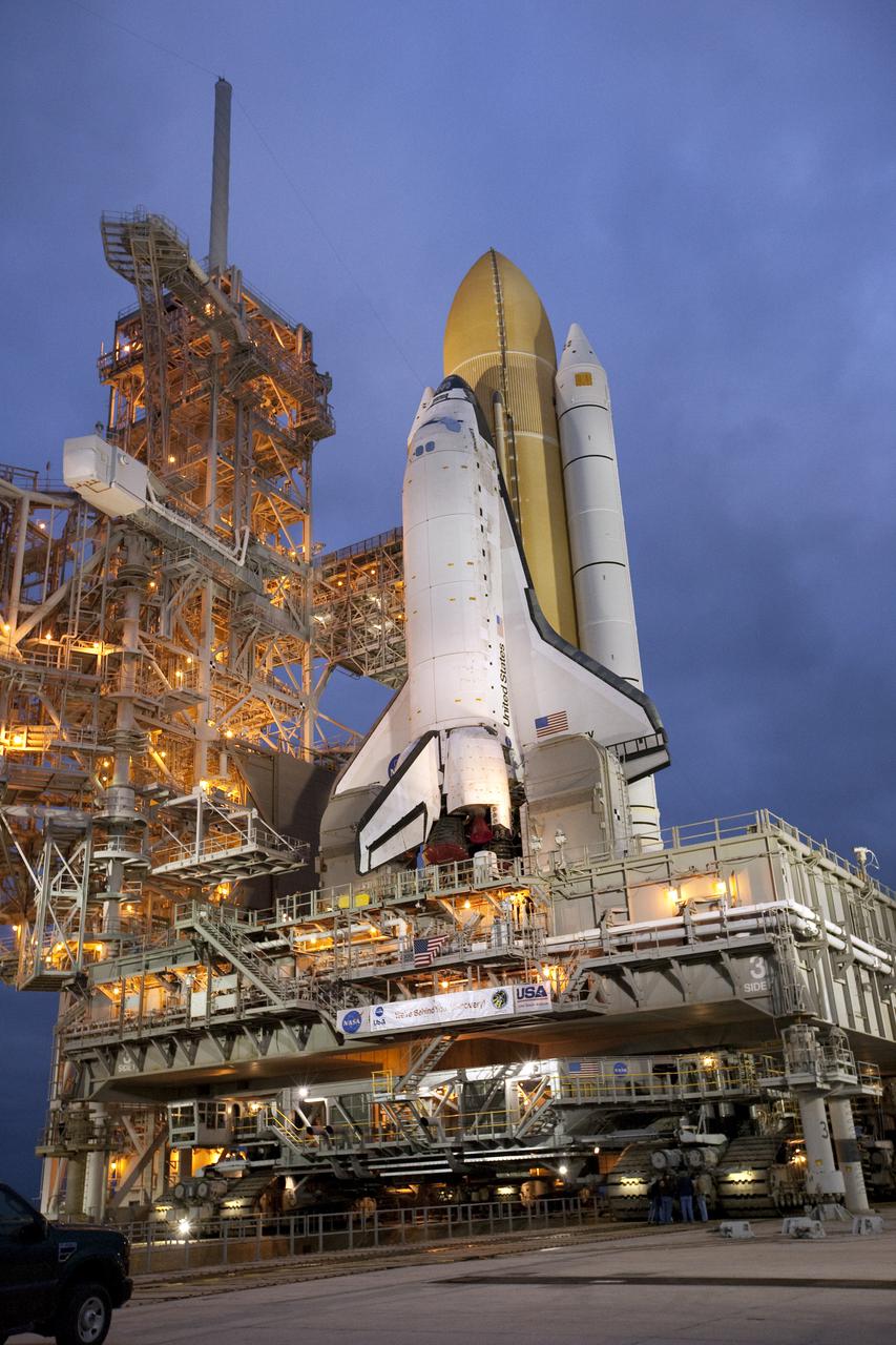 CAPE CANAVERAL, Fla. – The lightning mast atop the fixed service structure at Launch Pad 39A at NASA's Kennedy Space Center in Florida stands ready to protect space shuttle Discovery. Discovery's first motion on its 3.4-mile trip from the Vehicle Assembly Building was at 11:58 p.m. EST March 2. The shuttle was secured on the pad at 6:48 a.m. March 3. Rollout is a significant milestone in launch processing activities. The seven-member STS-131 crew will deliver the multi-purpose logistics module Leonardo, filled with resupply stowage platforms and racks, to the International Space Station aboard Discovery. Targeted for launch on April 5, STS-131 will be the 33rd shuttle mission to the station and the 131st shuttle mission overall. For information on the STS-131 mission and crew, visit http:__www.nasa.gov_mission_pages_shuttle_shuttlemissions_sts131_index.html. Photo credit: NASA_Amanda Diller