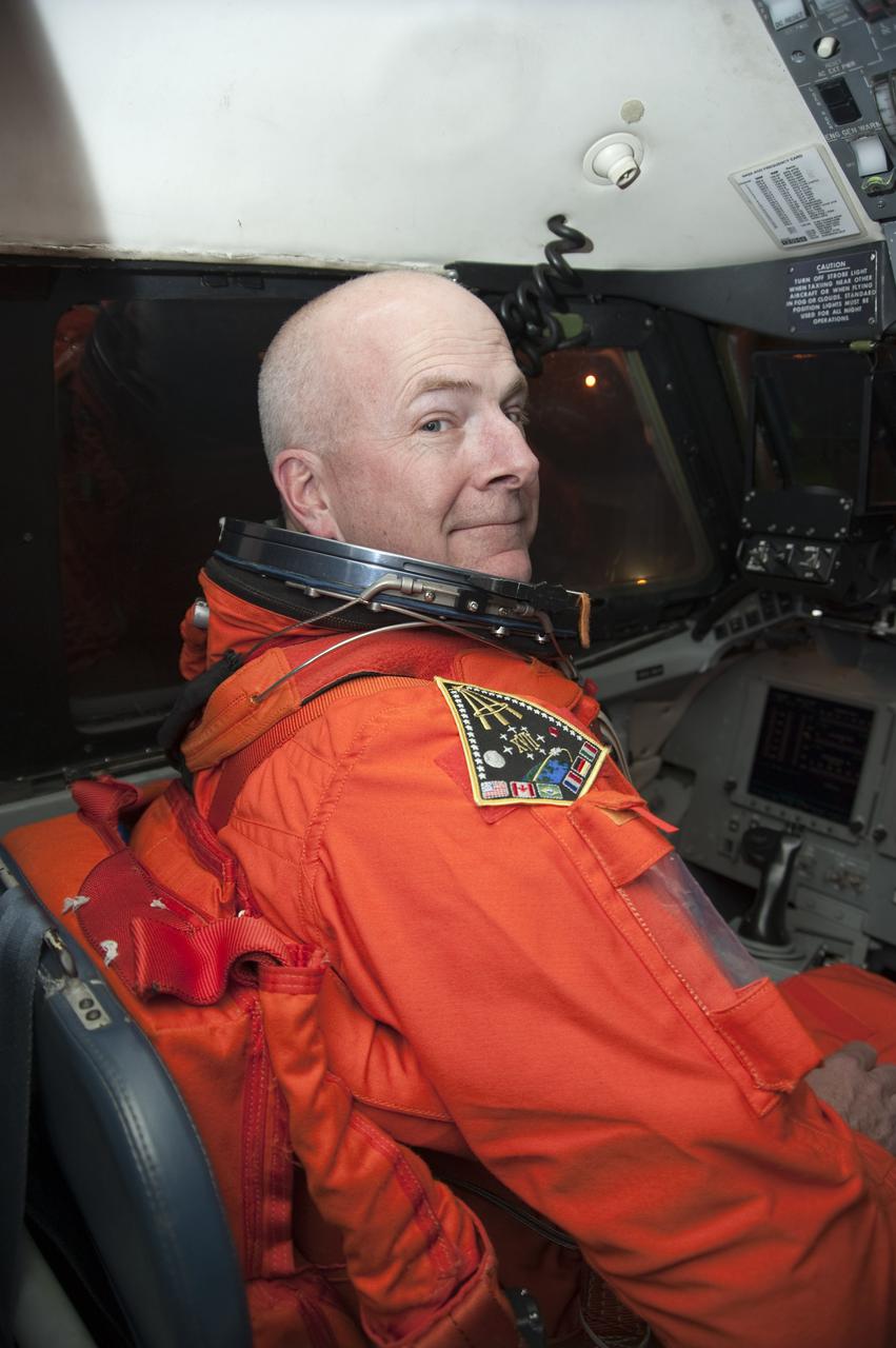 CAPE CANAVERAL, Fla. - At the Shuttle Landing Facility at NASA's Kennedy Space Center in Florida, STS-131 Commander Alan Poindexter gets settled in the cockpit of the Shuttle Training Aircraft, or STA, in which he will practice touch-and-go landings.  STS-131 will be Poindexter's second space shuttle flight.  The aircraft is a Gulfstream II jet, modified to handle like the space shuttle.  The crew members of space shuttle Discovery's STS-131 mission are at Kennedy for training related to their launch dress rehearsal, the Terminal Countdown Demonstration Test.  The seven-member crew will deliver the multi-purpose logistics module Leonardo, filled with resupply stowage platforms and racks, to the International Space Station aboard Discovery. Targeted for launch on April 5, STS-131 will be the 33rd shuttle mission to the station and the 131st shuttle mission overall. For information on the STS-131 mission and crew, visit http:__www.nasa.gov_mission_pages_shuttle_shuttlemissions_sts131_index.html. Photo credit: NASA_Kim Shiflett