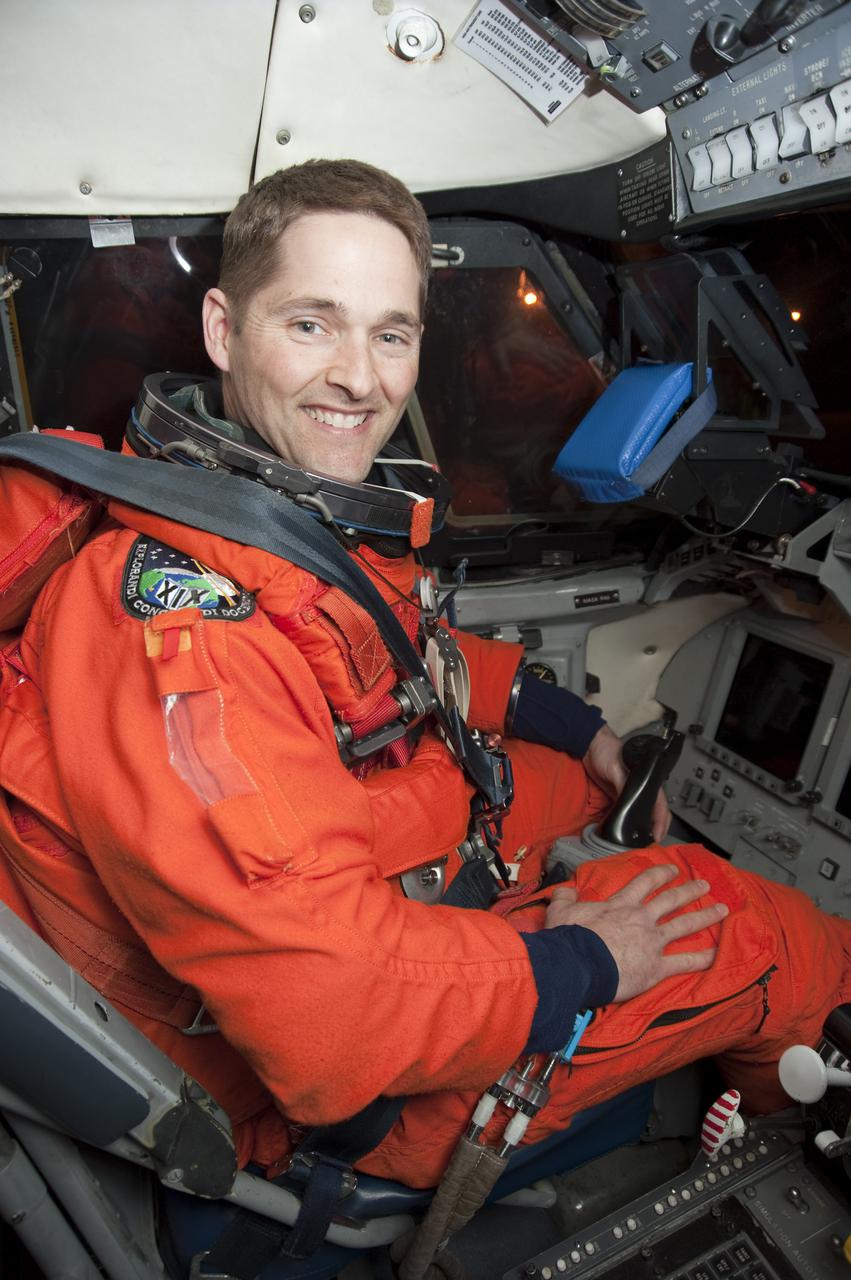 CAPE CANAVERAL, Fla. - At the Shuttle Landing Facility at NASA's Kennedy Space Center in Florida, STS-131 Pilot James P. Dutton Jr. gets settled in the cockpit of the Shuttle Training Aircraft, or STA, in which he will practice touch-and-go landings.  STS-131 will be Dutton's first space shuttle flight.  The aircraft is a Gulfstream II jet, modified to handle like the space shuttle.  The crew members of space shuttle Discovery's STS-131 mission are at Kennedy for training related to their launch dress rehearsal, the Terminal Countdown Demonstration Test.  The seven-member crew will deliver the multi-purpose logistics module Leonardo, filled with resupply stowage platforms and racks, to the International Space Station aboard Discovery. Targeted for launch on April 5, STS-131 will be the 33rd shuttle mission to the station and the 131st shuttle mission overall. For information on the STS-131 mission and crew, visit http:__www.nasa.gov_mission_pages_shuttle_shuttlemissions_sts131_index.html. Photo credit: NASA_Kim Shiflett