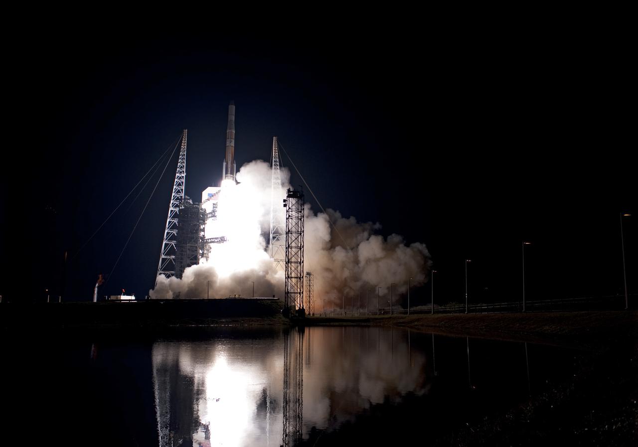 CAPE CANAVERAL, Fla. – Launch of the United Launch Alliance Delta IV rocket carrying NASA's GOES-P meteorological satellite is reflected in the water near Launch Complex 37 on Cape Canaveral Air Force Station in Florida. Liftoff was at 6:57 p.m. EST. GOES-P, the latest Geostationary Operational Environmental Satellite, was developed by NASA for the National Oceanic and Atmospheric Administration, or NOAA. The GOES-P spacecraft will be placed in a 22,300-mile-high geosynchronous orbit where it will appear to hover over a single point on Earth. The spacecraft is outfitted with a complex suite of observation instruments and cameras so it can accurately report on weather and climate conditions on Earth. For information on GOES-P, visit http:__www.nasa.gov_mission_pages_GOES-P_main_index.html. Photo credit: NASA_Sandra Joseph and Tony Gray