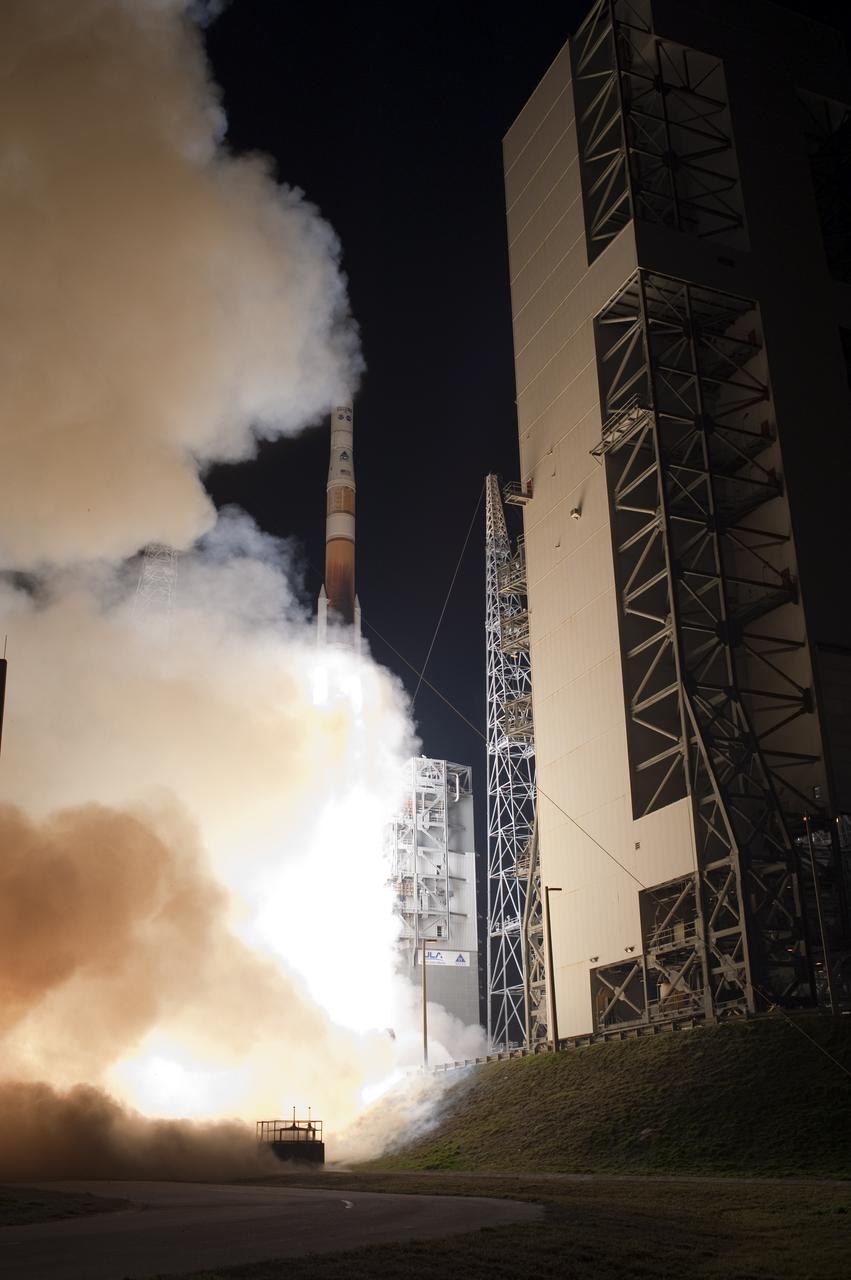 CAPE CANAVERAL, Fla. – An exhaust cloud building at Launch Complex 37 on Cape Canaveral Air Force Station in Florida obscures the United Launch Alliance Delta IV rocket carrying NASA's GOES-P meteorological satellite as it lifts off at 6:57 p.m. EST. GOES-P, the latest Geostationary Operational Environmental Satellite, was developed by NASA for the National Oceanic and Atmospheric Administration, or NOAA. The GOES-P spacecraft will be placed in a 22,300-mile-high geosynchronous orbit where it will appear to hover over a single point on Earth. The spacecraft is outfitted with a complex suite of observation instruments and cameras so it can accurately report on weather and climate conditions on Earth. For information on GOES-P, visit http:__www.nasa.gov_mission_pages_GOES-P_main_index.html. Photo credit: NASA_Sandra Joseph and Tony Gray