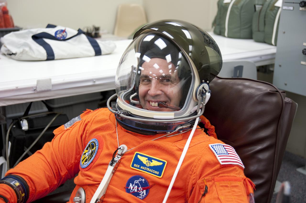 CAPE CANAVERAL, Fla. - In the Operations and Checkout Building at NASA's Kennedy Space Center in Florida, STS-131 Mission Specialist Rick Mastracchio verifies that his helmet is functioning properly.  The members of space shuttle Discovery's STS-131 crew put on their launch-and-entry suits before heading to the Astrovan for the ride to Launch Pad 39A.  The crew is participating in the Terminal Countdown Demonstration Test, or TCDT, a dress rehearsal for launch.  TCDT includes training on the emergency egress systems at the launch pad, driving practice of the M-113 armored personnel carrier and a simulated launch countdown. The crew will deliver the multi-purpose logistics module Leonard, filled with resupply stowage platforms and science racks, to the International Space Station. STS-131, targeted for launch on April 5, will be the 33rd shuttle mission to the station and the 131st shuttle mission overall. For information on the STS-131 mission and crew, visit http:__www.nasa.gov_mission_pages_shuttle_shuttlemissions_sts131_index.htm. Photo credit: NASA_Kim Shiflett