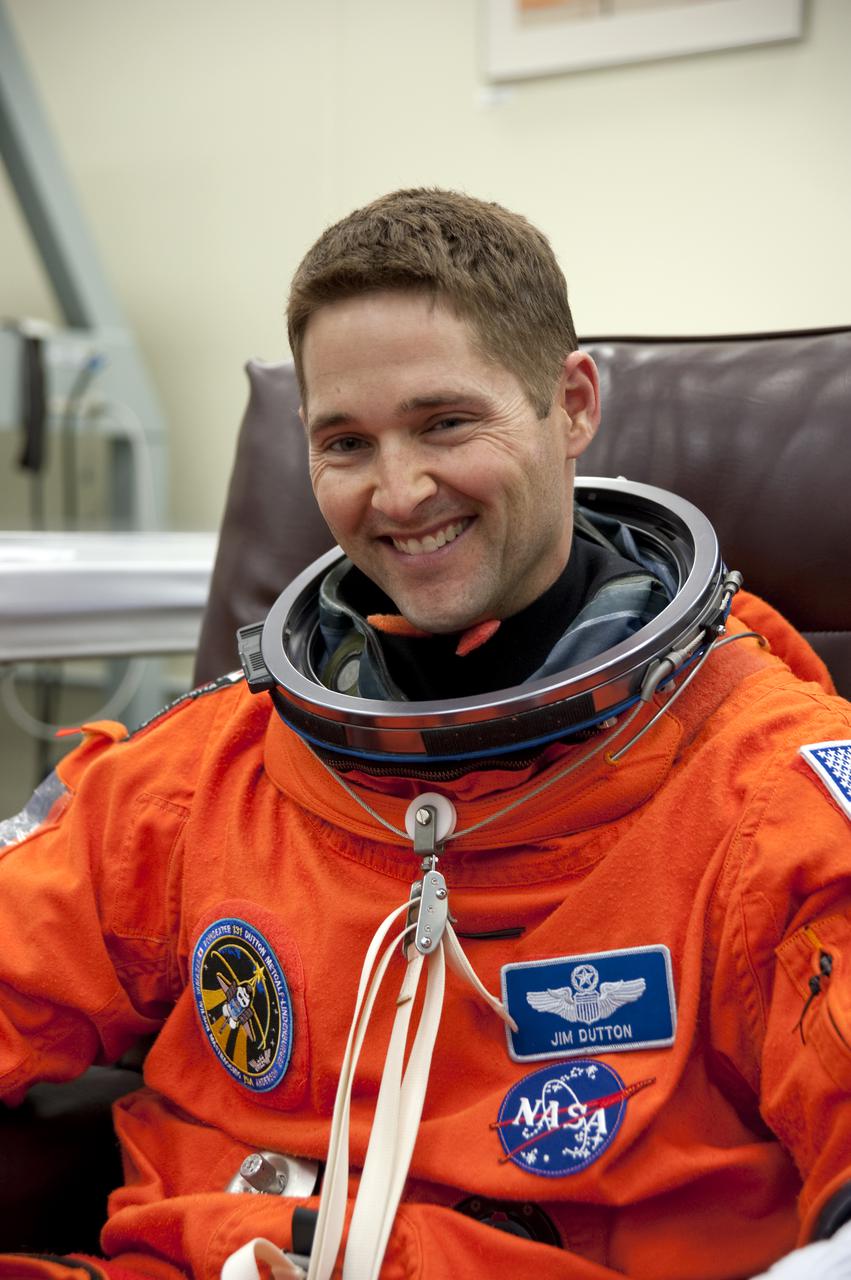 CAPE CANAVERAL, Fla. - In the Operations and Checkout Building at NASA's Kennedy Space Center in Florida, STS-131 Pilot James P. Dutton Jr. suits up for his first practice countdown. The members of space shuttle Discovery's STS-131 crew put on their launch-and-entry suits before heading to the Astrovan for the ride to Launch Pad 39A. The crew is participating in the Terminal Countdown Demonstration Test, or TCDT, a dress rehearsal for launch. TCDT includes training on the emergency egress systems at the launch pad, driving practice of the M-113 armored personnel carrier and a simulated launch countdown. The crew will deliver the multi-purpose logistics module Leonard, filled with resupply stowage platforms and science racks, to the International Space Station. STS-131, targeted for launch on April 5, will be the 33rd shuttle mission to the station and the 131st shuttle mission overall. For information on the STS-131 mission and crew, visit http:__www.nasa.gov_mission_pages_shuttle_shuttlemissions_sts131_index.htm. Photo credit: NASA_Kim Shiflett