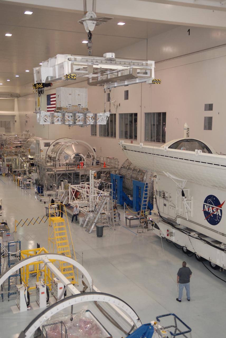 STS-131 LMC Support Structure Carrier Lift & Installation in Canister