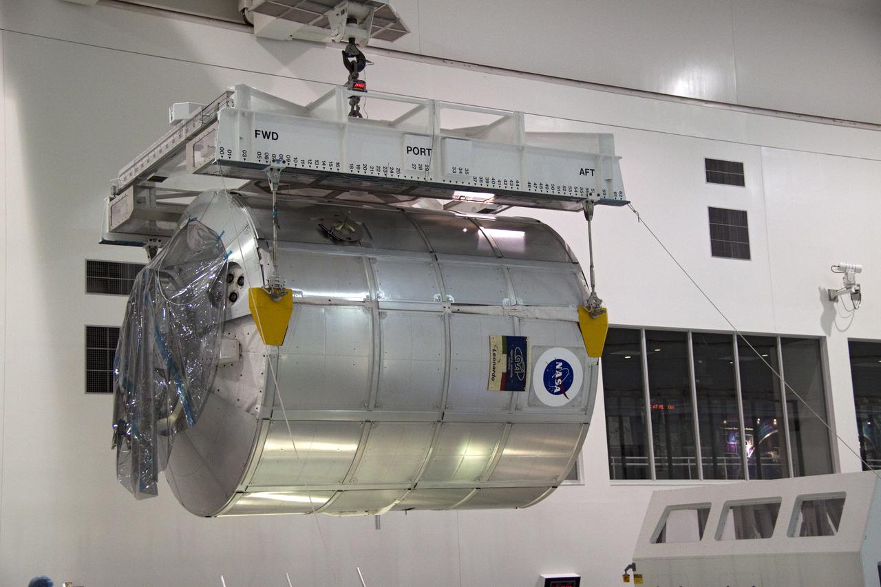 STS-131 MPLM LEONARDO MOVE FROM WORKSTAND TO WEIGHT & CG THEN MOVE TO CANISTER