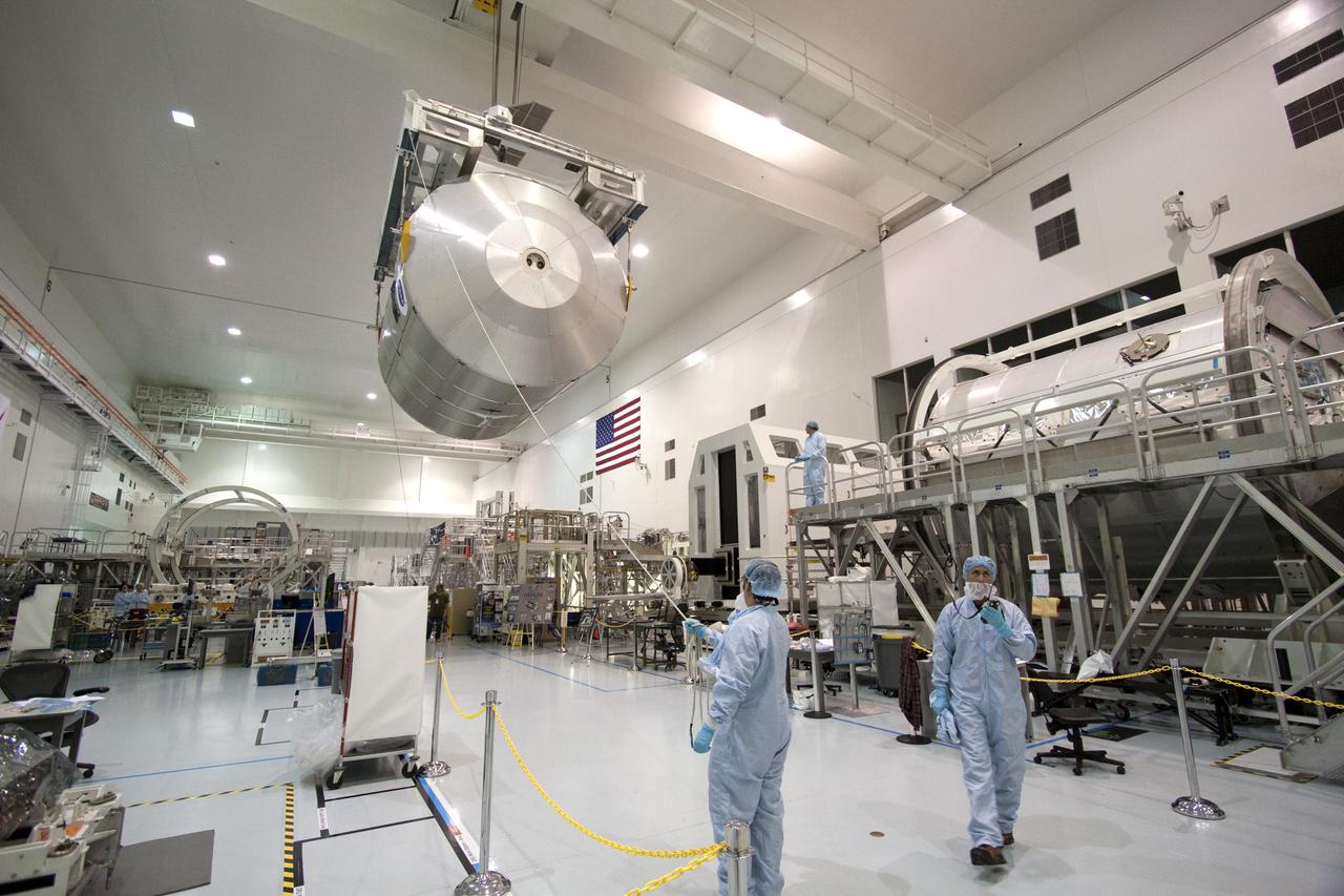 STS-131 MPLM LEONARDO MOVE FROM WORKSTAND TO WEIGHT & CG THEN MOVE TO CANISTER