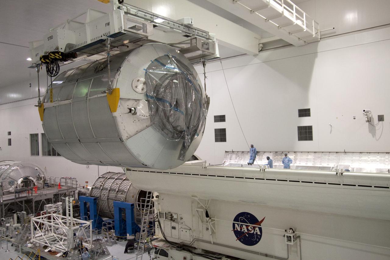 STS-131 MPLM LEONARDO MOVE FROM WORKSTAND TO WEIGHT & CG THEN MOVE TO CANISTER