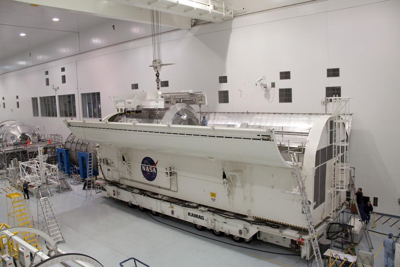 STS-131 MPLM LEONARDO MOVE FROM WORKSTAND TO WEIGHT & CG THEN MOVE TO CANISTER