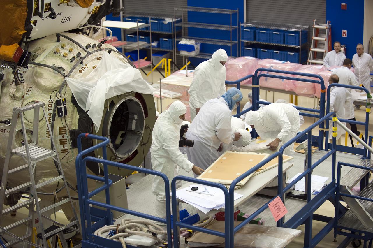 CAPE CANAVERAL, Fla. – In the Astrotech payload processing facility at Port Canaveral, Fla., preparations are under way to install supplies and other cargo in the Russian-built Mini-Research Module, or MRM, at left. The six-member crew of space shuttle Atlantis' STS-132 mission will deliver an Integrated Cargo Carrier and the MRM to the International Space Station. The second in a series of new pressurized components for Russia, the MRM will be permanently attached to the bottom port of the Zarya module. The MRM also will carry U.S. pressurized cargo. STS-132 is the 34th mission to the station and the 132nd space shuttle mission. Launch is targeted for May 14. For information on the STS-132 mission, visit http:__www.nasa.gov_mission_pages_shuttle_shuttlemissions_sts132_index.html. Photo credit: NASA_Kim Shiflett