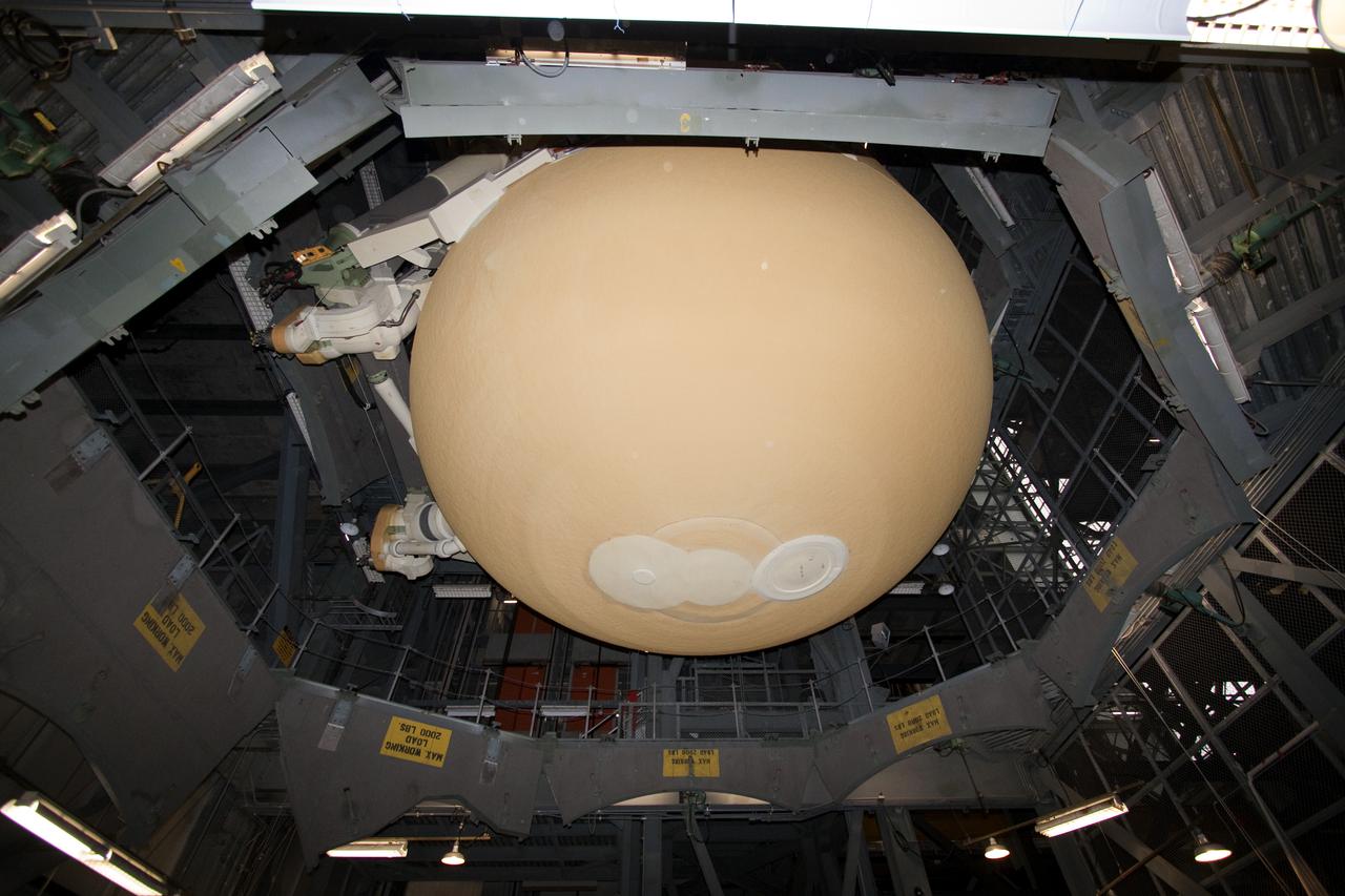 CAPE CANAVERAL, Fla. - In the Vehicle Assembly Building at NASA's Kennedy Space Center in Florida, the external fuel tank for space shuttle Atlantis' STS-132 mission, ET-136, is lifted from its test cell. The external tank arrived at Kennedy from NASA's Michoud Assembly Facility on March 1 aboard the Pegasus barge. The six-member STS-132 crew will deliver an Integrated Cargo Carrier and a Russian-built Mini-Research Module, or MRM-1, to the International Space Station. Launch is targeted for May 14. For information on the STS-132 mission, visit http:__www.nasa.gov_mission_pages_shuttle_shuttlemissions_sts132_index.html. Photo credit: NASA_Jack Pfaller