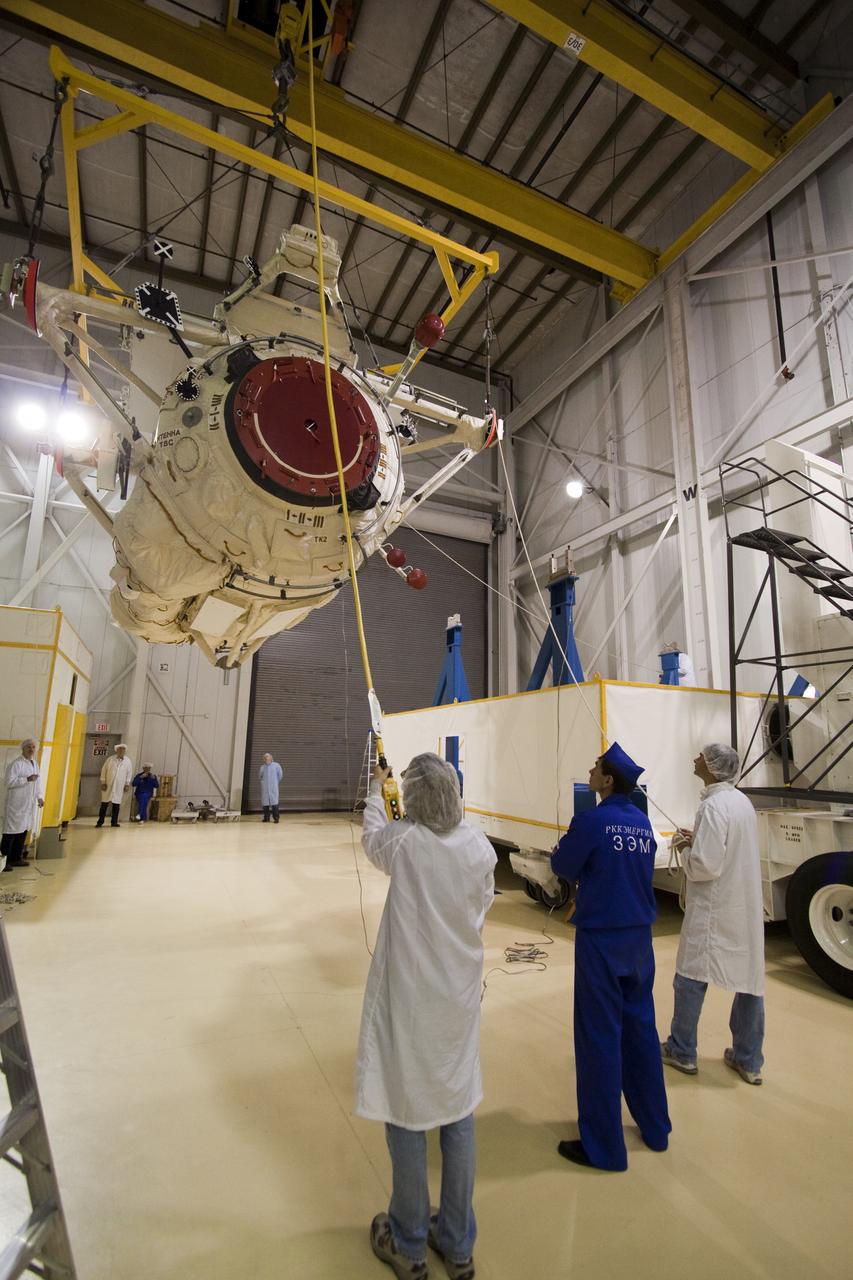 STS-132 MINI RESEARCH MODULE INSTALL TO TRANSPORT CONTAINER
