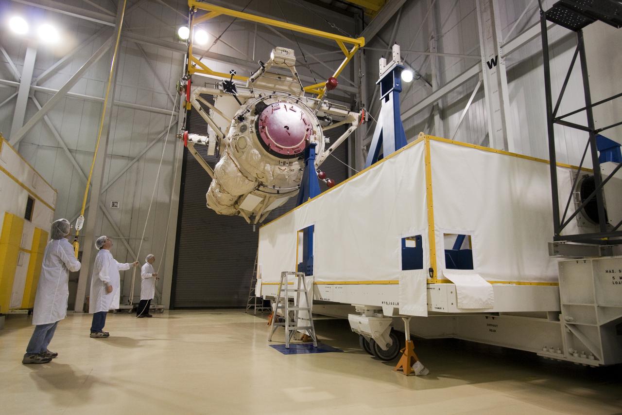 STS-132 MINI RESEARCH MODULE INSTALL TO TRANSPORT CONTAINER