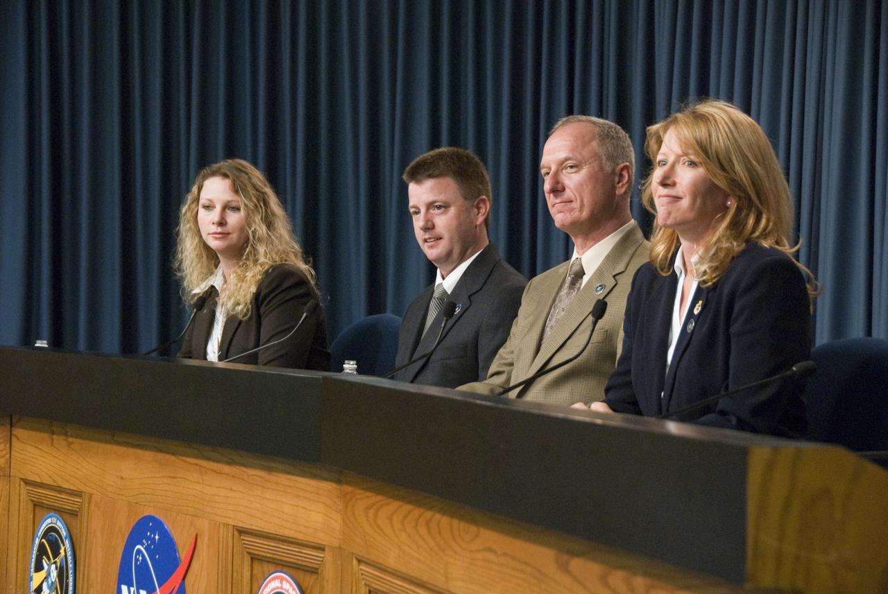 CAPE CANAVERAL, Fla. - In the Press Site auditorium at NASA's Kennedy Space Center in Florida, NASA managers participate in a prelaunch news conference for space shuttle Discovery's STS-131 mission.  From left are Candrea Thomas, NASA Public Affairs moderator; Mike Moses, chair, Mission Management Team; Pete Nickolenko, STS-131 launch director; and Kathy Winters, shuttle weather officer.   Liftoff of the STS-131 mission is set for 6:21 a.m. EDT on April 5. On STS-131, the seven-member crew will deliver the multi-purpose logistics module Leonardo, filled with supplies, a new crew sleeping quarters and science racks that will be transferred to the International Space Station's laboratories.  The crew also will switch out a gyroscope on the station’s truss, install a spare ammonia storage tank and retrieve a Japanese experiment from the station’s exterior.  STS-131 is the 33rd shuttle mission to the station and the 131st shuttle mission overall. For information on the STS-131 mission and crew, visit http:__www.nasa.gov_mission_pages_shuttle_shuttlemissions_sts131_index.html.  Photo credit: NASA_Ben Smegelsky