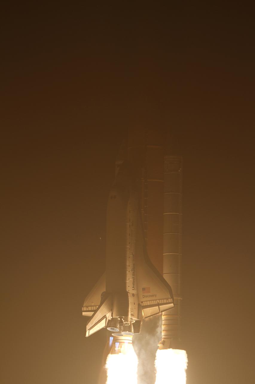 CAPE CANAVERAL, Fla. - Space shuttle Discovery roars into the predawn sky over Launch Pad 39A at NASA's Kennedy Space Center in Florida at 6:21 a.m. EDT April 5 kicking off the STS-131 mission. The seven-member crew will deliver the multi-purpose logistics module Leonardo, filled with supplies, a new crew sleeping quarters and science racks that will be transferred to the International Space Station's laboratories. The crew also will switch out a gyroscope on the station’s truss, install a spare ammonia storage tank and retrieve a Japanese experiment from the station’s exterior. STS-131 is the 33rd shuttle mission to the station and the 131st shuttle mission overall. For information on the STS-131 mission and crew, visit http:__www.nasa.gov_mission_pages_shuttle_shuttlemissions_sts131_index.html. Photo credit: NASA_Kenny Allen