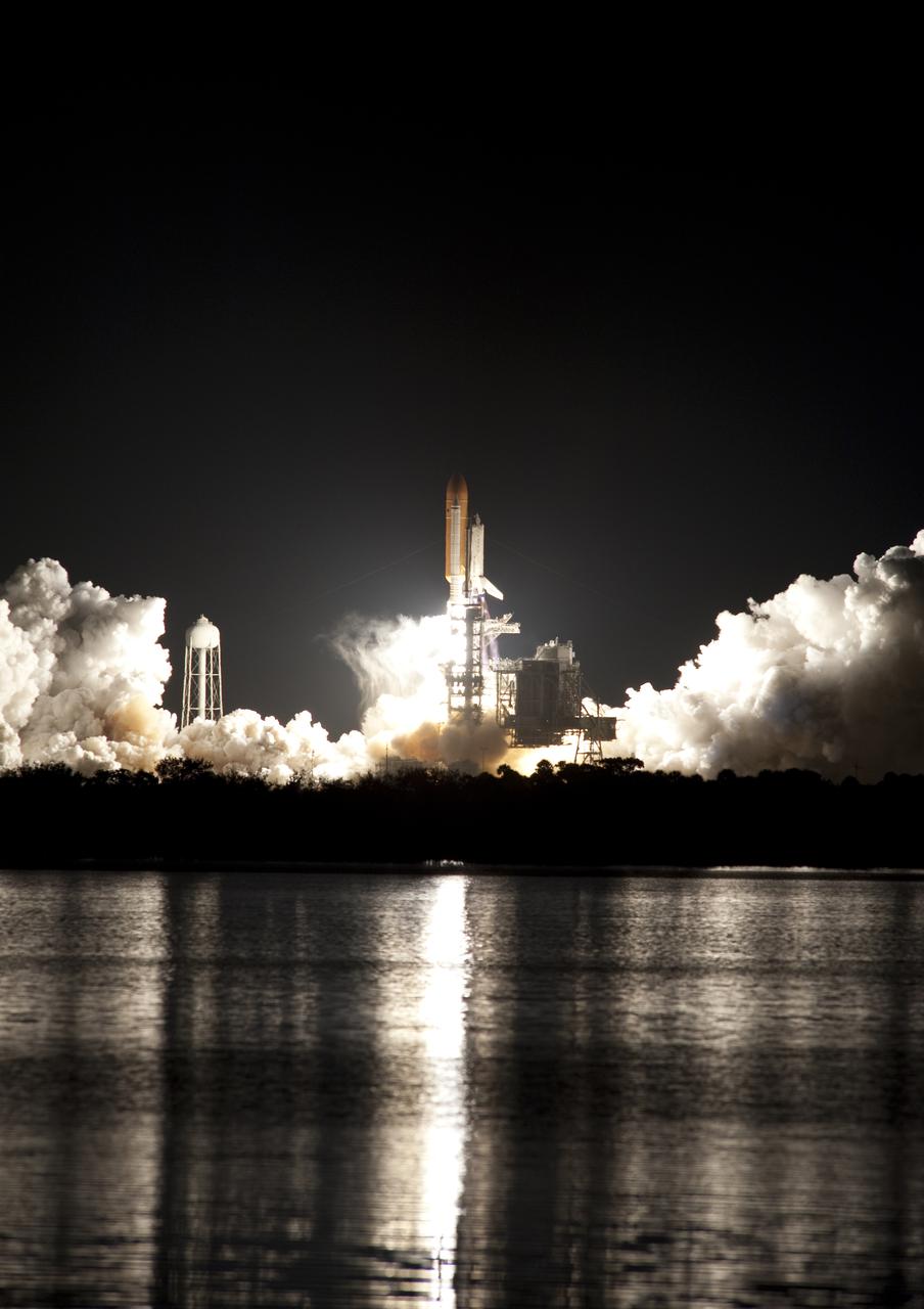 CAPE CANAVERAL, Fla. - An exhaust cloud builds at Launch Pad 39A at NASA's Kennedy Space Center in Florida as space shuttle Discovery lifts off at 6:21 a.m. EDT April 5 to begin the STS-131 mission. The seven-member crew will deliver the multi-purpose logistics module Leonardo, filled with supplies, a new crew sleeping quarters and science racks that will be transferred to the International Space Station's laboratories. The crew also will switch out a gyroscope on the station’s truss, install a spare ammonia storage tank and retrieve a Japanese experiment from the station’s exterior. STS-131 is the 33rd shuttle mission to the station and the 131st shuttle mission overall. For information on the STS-131 mission and crew, visit http:__www.nasa.gov_mission_pages_shuttle_shuttlemissions_sts131_index.html. Photo credit: NASA_Ben Cooper