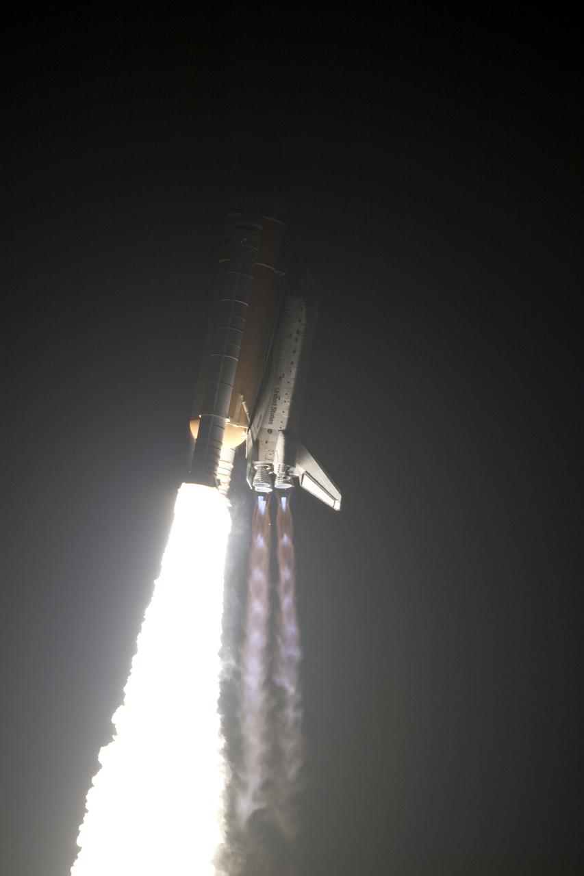 CAPE CANAVERAL, Fla. - The light from the solid rocket boosters and main engines of space shuttle Discovery is blinding as the shuttle rushes to orbit from Launch Pad 39A at NASA's Kennedy Space Center.  Liftoff on the STS-131 mission was on time at 6:21 a.m. EDT.  The seven-member crew will deliver the multi-purpose logistics module Leonardo, filled with supplies, a new crew sleeping quarters and science racks that will be transferred to the International Space Station's laboratories.  The crew also will switch out a gyroscope on the station’s truss, install a spare ammonia storage tank and retrieve a Japanese experiment from the station’s exterior.  STS-131 is the 33rd shuttle mission to the station and the 131st shuttle mission overall. For information on the STS-131 mission and crew, visit http:__www.nasa.gov_mission_pages_shuttle_shuttlemissions_sts131_index.html.  Photo credit: NASA_Kenny Allen