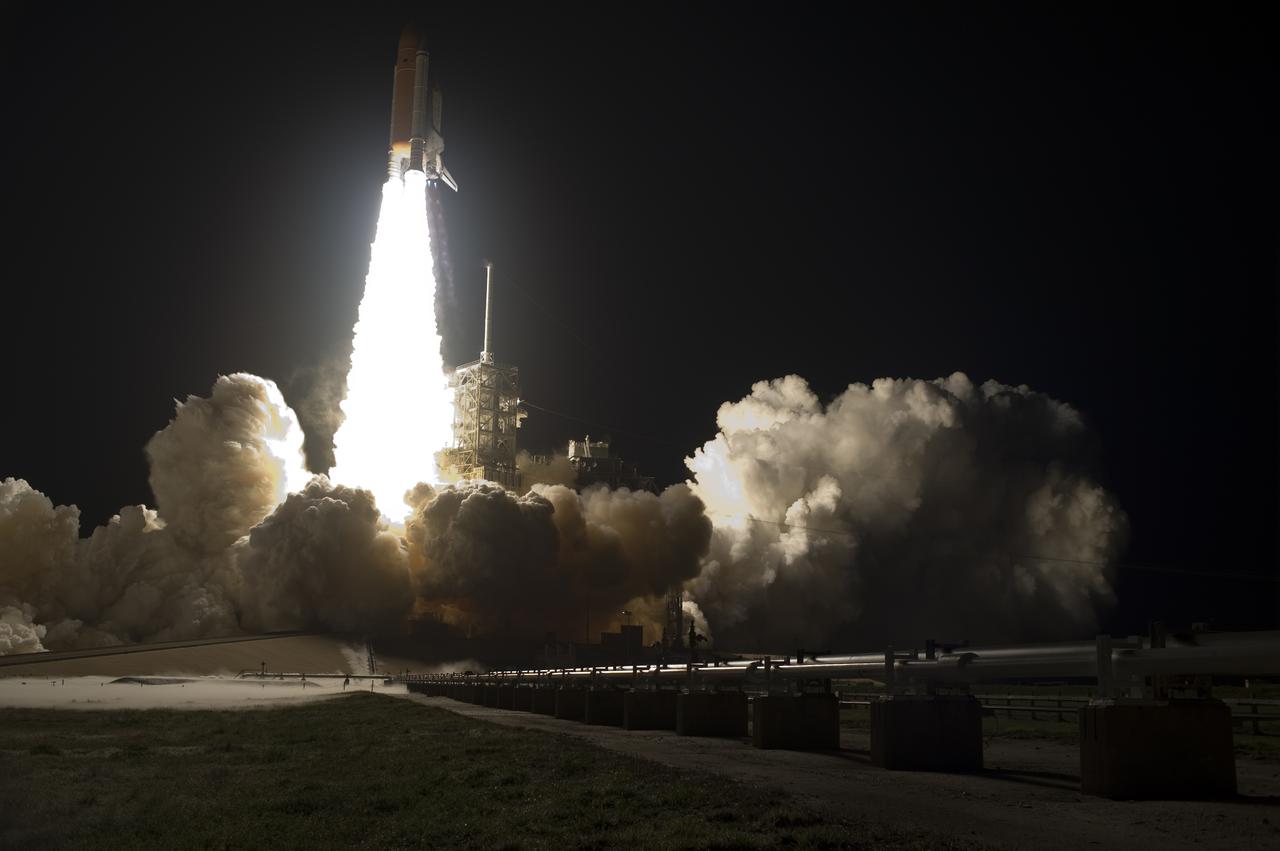 CAPE CANAVERAL, Fla. - Rising on a column of fire, space shuttle Discovery hurtles toward space after liftoff from Launch Pad 39A at NASA's Kennedy Space Center in Florida. Liftoff on the STS-131 mission was on time at 6:21 a.m. EDT.   The seven-member crew will deliver the multi-purpose logistics module Leonardo, filled with supplies, a new crew sleeping quarters and science racks that will be transferred to the International Space Station's laboratories.  The crew also will switch out a gyroscope on the station’s truss, install a spare ammonia storage tank and retrieve a Japanese experiment from the station’s exterior.  STS-131 is the 33rd shuttle mission to the station and the 131st shuttle mission overall. For information on the STS-131 mission and crew, visit http:__www.nasa.gov_mission_pages_shuttle_shuttlemissions_sts131_index.html.  Photo credit: NASA_Sandra Joseph and Kevin O'Connell
