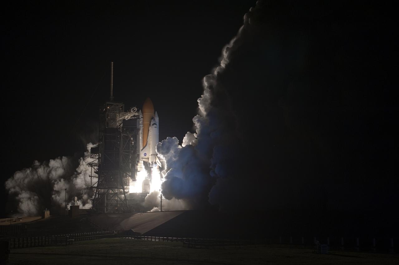 CAPE CANAVERAL, Fla. - An exhaust cloud threatens to obscure the view of space shuttle Discovery as it hurtles toward space after liftoff from Launch Pad 39A at NASA's Kennedy Space Center in Florida. Launch on the STS-131 mission was on time at 6:21 a.m. EDT. The seven-member crew will deliver the multi-purpose logistics module Leonardo, filled with supplies, a new crew sleeping quarters and science racks that will be transferred to the International Space Station's laboratories. The crew also will switch out a gyroscope on the station’s truss, install a spare ammonia storage tank and retrieve a Japanese experiment from the station’s exterior. STS-131 is the 33rd shuttle mission to the station and the 131st shuttle mission overall. For information on the STS-131 mission and crew, visit http:__www.nasa.gov_mission_pages_shuttle_shuttlemissions_sts131_index.html. Photo credit: NASA_Tony Gray and Tom Farrar