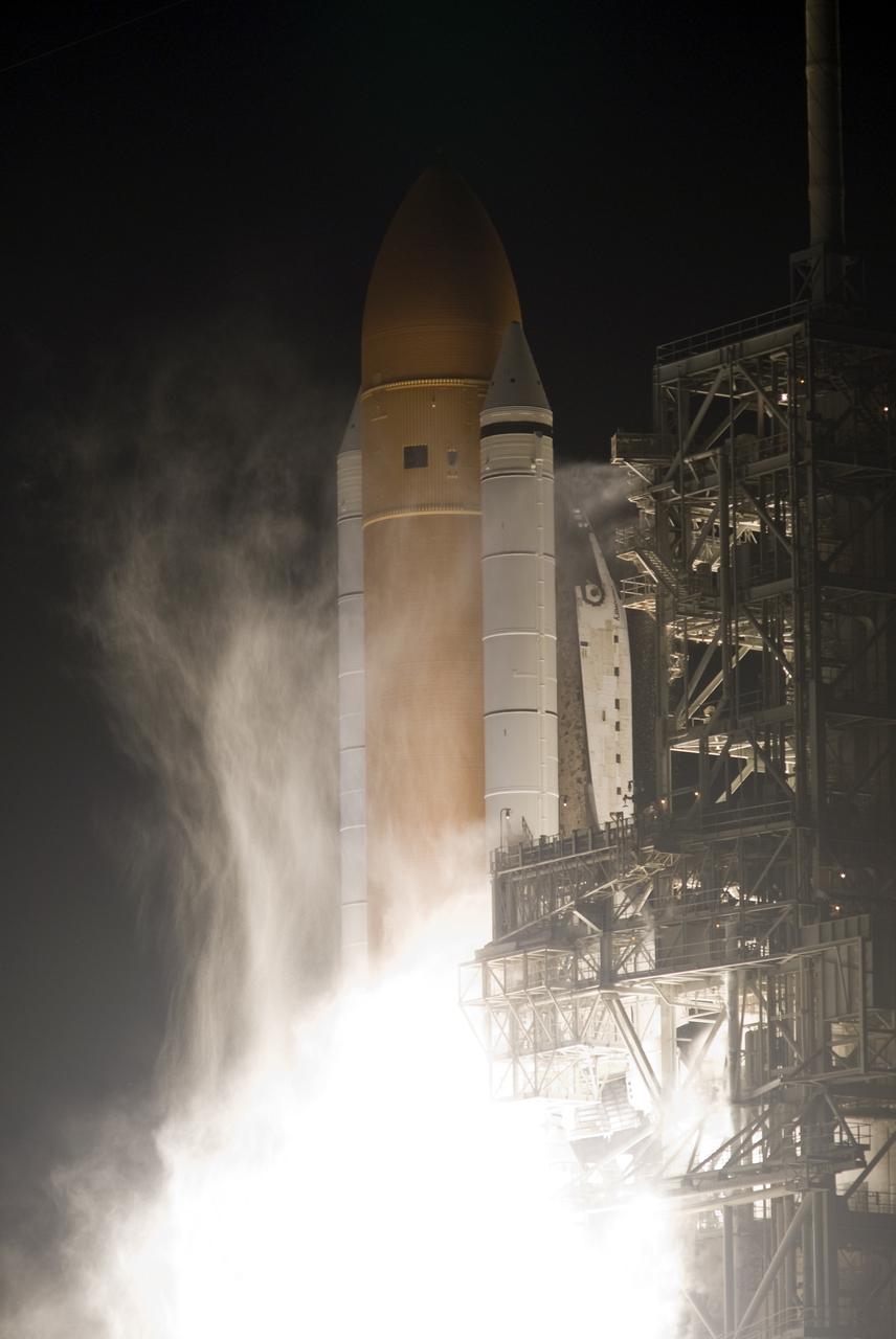 CAPE CANAVERAL, Fla. - Smoke and steam billow across Launch Pad 39A at NASA's Kennedy Space Center in Florida as space shuttle Discovery lifts off on the STS-131 mission. Launch was on time at 6:21 a.m. EDT April 5.  The seven-member crew will deliver the multi-purpose logistics module Leonardo, filled with supplies, a new crew sleeping quarters and science racks that will be transferred to the International Space Station's laboratories.  The crew also will switch out a gyroscope on the station’s truss, install a spare ammonia storage tank and retrieve a Japanese experiment from the station’s exterior.  STS-131 is the 33rd shuttle mission to the station and the 131st shuttle mission overall. For information on the STS-131 mission and crew, visit http:__www.nasa.gov_mission_pages_shuttle_shuttlemissions_sts131_index.html.  Photo credit: NASA_Rusty Backer and Michael Gayle