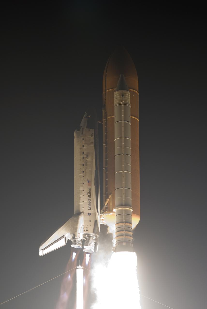 CAPE CANAVERAL, Fla.  - Space shuttle Discovery roars off Launch Pad 39A at NASA's Kennedy Space Center in Florida beginning the STS-131 mission.  Shuttle Discovery lifted off at 6:21 a.m. EDT on April 5, 2010. The seven-member STS-131 crew will deliver the multi-purpose logistics module Leonardo, filled with supplies, a new crew sleeping quarters and science racks that will be transferred to the International Space Station's laboratories. The crew also will switch out a gyroscope on the station’s truss, install a spare ammonia storage tank and retrieve a Japanese experiment from the station’s exterior. STS-131 is the 33rd shuttle mission to the station and the 131st shuttle mission overall. For information on the STS-131 mission and crew, visit http:__www.nasa.gov_mission_pages_shuttle_shuttlemissions_sts131_index.html. Photo credit: NASA_Rusty Backer and Michael Gayle