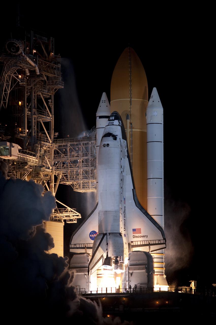CAPE CANAVERAL, Fla.  - Space shuttle Discovery majestically begins its ascent into the predawn sky at Launch Pad 39A at NASA's Kennedy Space Center in Florida.  Shuttle Discovery lifted off at 6:21 a.m. EDT on April 5, 2010. The seven-member STS-131 crew will deliver the multi-purpose logistics module Leonardo, filled with supplies, a new crew sleeping quarters and science racks that will be transferred to the International Space Station's laboratories. The crew also will switch out a gyroscope on the station’s truss, install a spare ammonia storage tank and retrieve a Japanese experiment from the station’s exterior. STS-131 is the 33rd shuttle mission to the station and the 131st shuttle mission overall. For information on the STS-131 mission and crew, visit http:__www.nasa.gov_mission_pages_shuttle_shuttlemissions_sts131_index.html. Photo credit: NASA_Sandra Joseph and Kevin O'Connell