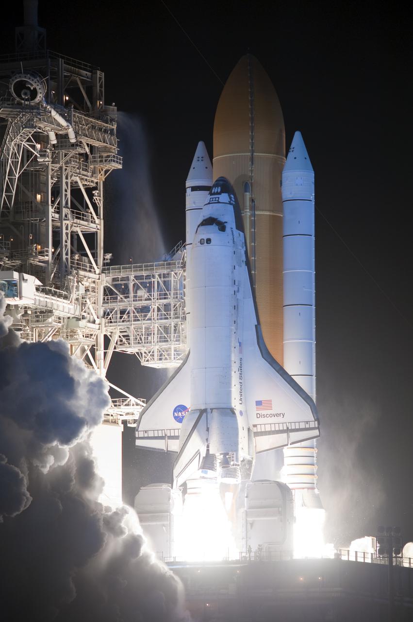 CAPE CANAVERAL, Fla.  - On Launch Pad 39A at NASA's Kennedy Space Center in Florida space shuttle Discovery lights up the early morning sky as it lifts off on the STS-131 mission.  Shuttle Discovery lifted off at 6:21 a.m. EDT on April 5, 2010. The seven-member STS-131 crew will deliver the multi-purpose logistics module Leonardo, filled with supplies, a new crew sleeping quarters and science racks that will be transferred to the International Space Station's laboratories. The crew also will switch out a gyroscope on the station’s truss, install a spare ammonia storage tank and retrieve a Japanese experiment from the station’s exterior. STS-131 is the 33rd shuttle mission to the station and the 131st shuttle mission overall. For information on the STS-131 mission and crew, visit http:__www.nasa.gov_mission_pages_shuttle_shuttlemissions_sts131_index.html. Photo credit: NASA_Sandra Joseph and Kevin O'Connell
