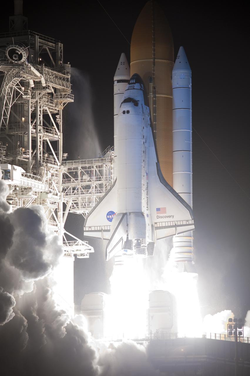 CAPE CANAVERAL, Fla.  - Space shuttle Discovery leaps off of Launch Pad 39A in a brilliant tower of smoke and steam headed for space on the STS-131 mission.  Shuttle Discovery lifted off at 6:21 a.m. EDT on April 5, 2010. The seven-member STS-131 crew will deliver the multi-purpose logistics module Leonardo, filled with supplies, a new crew sleeping quarters and science racks that will be transferred to the International Space Station's laboratories. The crew also will switch out a gyroscope on the station’s truss, install a spare ammonia storage tank and retrieve a Japanese experiment from the station’s exterior. STS-131 is the 33rd shuttle mission to the station and the 131st shuttle mission overall. For information on the STS-131 mission and crew, visit http:__www.nasa.gov_mission_pages_shuttle_shuttlemissions_sts131_index.html. Photo credit: NASA_Sandra Joseph and Kevin O'Connell