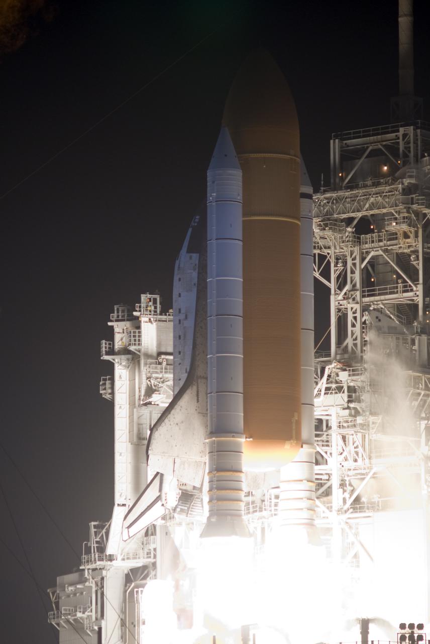 CAPE CANAVERAL, Fla.  - A radiant cloud of smoke and steam swirl around Launch Pad 39A at NASA's Kennedy Space Center in Florida as space shuttle Discovery roars to life lifting off on the STS-131 mission.  Shuttle Discovery lifted off at 6:21 a.m. EDT on April 5, 2010. The seven-member STS-131 crew will deliver the multi-purpose logistics module Leonardo, filled with supplies, a new crew sleeping quarters and science racks that will be transferred to the International Space Station's laboratories. The crew also will switch out a gyroscope on the station’s truss, install a spare ammonia storage tank and retrieve a Japanese experiment from the station’s exterior. STS-131 is the 33rd shuttle mission to the station and the 131st shuttle mission overall. For information on the STS-131 mission and crew, visit http:__www.nasa.gov_mission_pages_shuttle_shuttlemissions_sts131_index.html. Photo credit: NASA_Rusty Backer and Michael Gayle