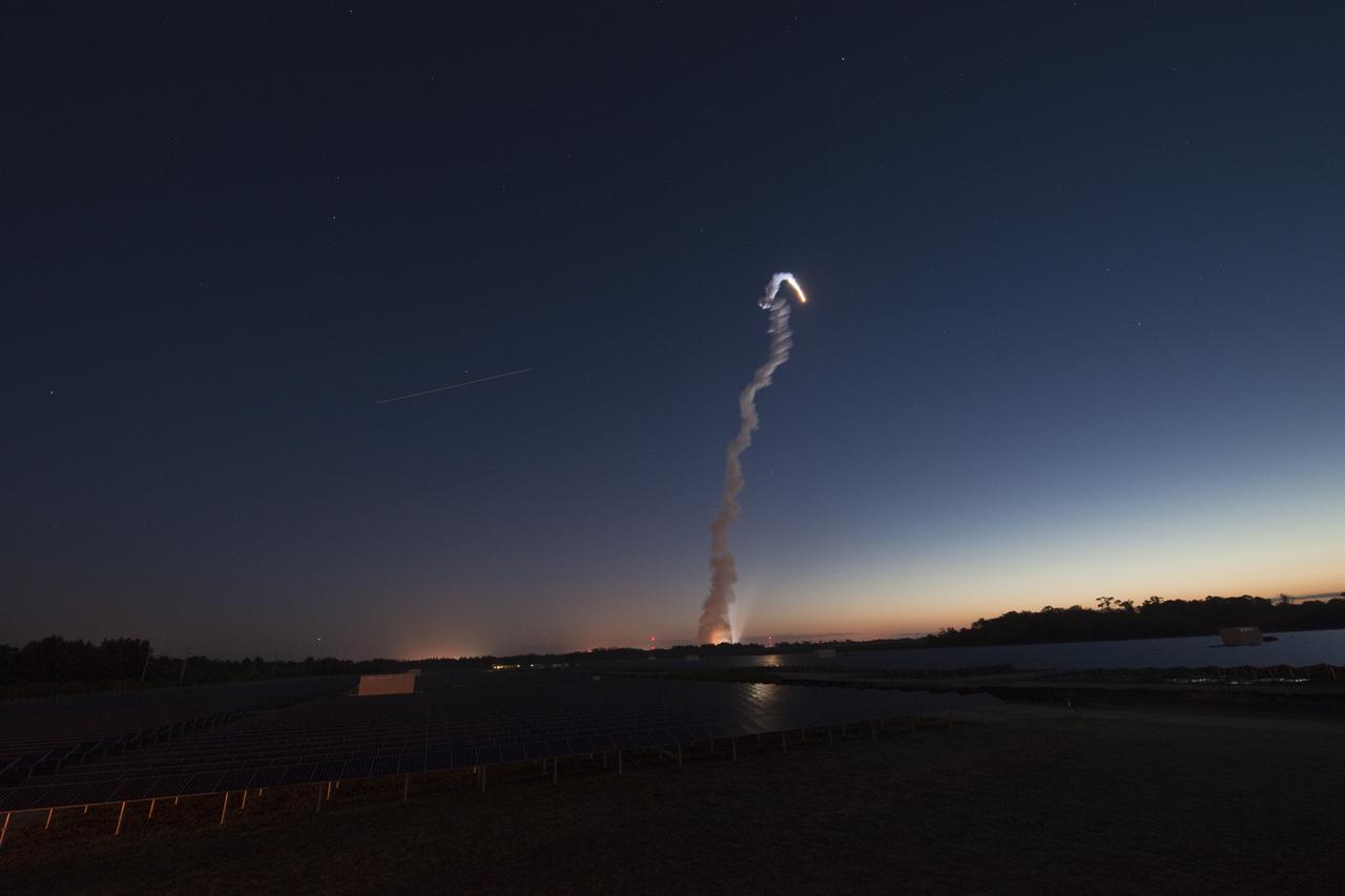CAPE CANAVERAL, Fla.  - The launch of space shuttle Discovery on the STS-131 mission was captured from a field of Florida Power and Light solar panels (foreground) off of S.R. 3 at NASA's Kennedy Space Center in Florida.  NASA and FPL are members of a public-private partnership that promotes a clean-energy future and this site will produce an estimated 10 megawatts of emissions-free power for FPandL customers.  Shuttle Discovery lifted off at 6:21 a.m. EDT on April 5, 2010. The seven-member STS-131 crew will deliver the multi-purpose logistics module Leonardo, filled with supplies, a new crew sleeping quarters and science racks that will be transferred to the International Space Station's laboratories. The crew also will switch out a gyroscope on the station’s truss, install a spare ammonia storage tank and retrieve a Japanese experiment from the station’s exterior. STS-131 is the 33rd shuttle mission to the station and the 131st shuttle mission overall. For information on the STS-131 mission and crew, visit http:__www.nasa.gov_mission_pages_shuttle_shuttlemissions_sts131_index.html. Photo credit: Courtesy of Adam Nehr