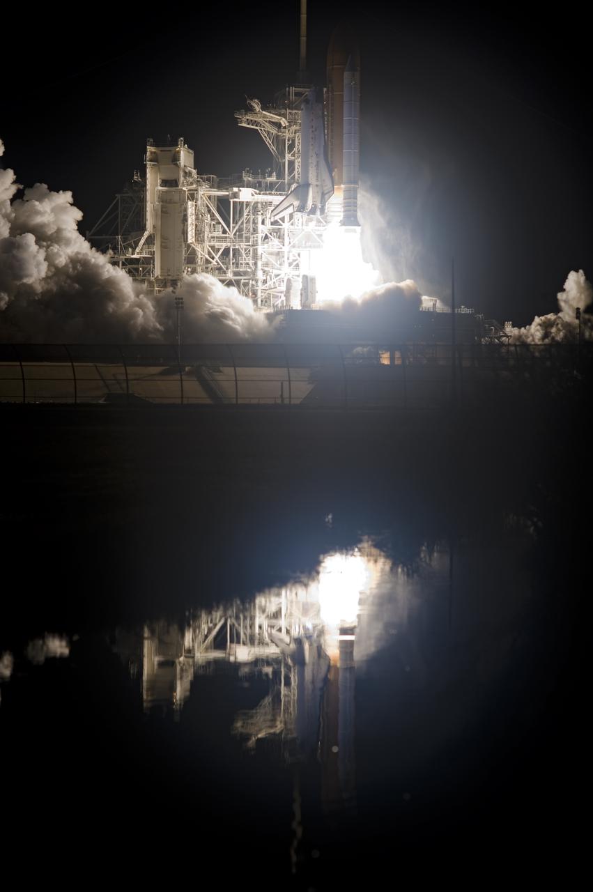 CAPE CANAVERAL, Fla.  - Rising on a column of fire, space shuttle Discovery heads toward space after liftoff from Launch Pad 39A at NASA's Kennedy Space Center in Florida.  Shuttle Discovery lifted off at 6:21 a.m. EDT on April 5, 2010. The seven-member STS-131 crew will deliver the multi-purpose logistics module Leonardo, filled with supplies, a new crew sleeping quarters and science racks that will be transferred to the International Space Station's laboratories. The crew also will switch out a gyroscope on the station’s truss, install a spare ammonia storage tank and retrieve a Japanese experiment from the station’s exterior. STS-131 is the 33rd shuttle mission to the station and the 131st shuttle mission overall. For information on the STS-131 mission and crew, visit http:__www.nasa.gov_mission_pages_shuttle_shuttlemissions_sts131_index.html.  Photo credit: NASA_Tony Gray and Tom Farrar