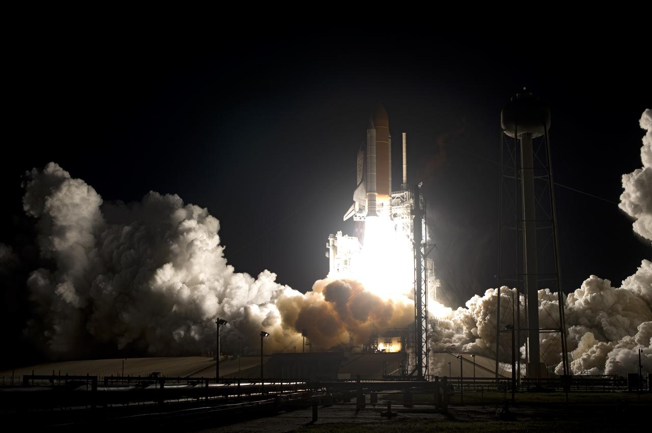 CAPE CANAVERAL, Fla.  - Streaking up from a tower of flame and clouds space shuttle Discovery roars off Launch Pad 39A at NASA's Kennedy Space Center in Florida on its STS-131 mission.  Shuttle Discovery lifted off at 6:21 a.m. EDT on April 5, 2010. The seven-member STS-131 crew will deliver the multi-purpose logistics module Leonardo, filled with supplies, a new crew sleeping quarters and science racks that will be transferred to the International Space Station's laboratories. The crew also will switch out a gyroscope on the station’s truss, install a spare ammonia storage tank and retrieve a Japanese experiment from the station’s exterior. STS-131 is the 33rd shuttle mission to the station and the 131st shuttle mission overall. For information on the STS-131 mission and crew, visit http:__www.nasa.gov_mission_pages_shuttle_shuttlemissions_sts131_index.html.  Photo credit: NASA_Sandra Joseph and Kevin O'Connell